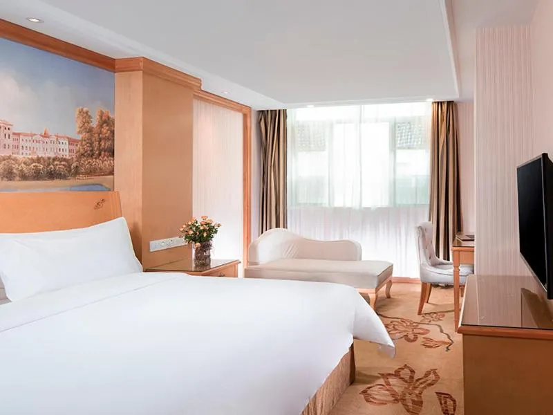 Bed in Vienna Hotel Qingyuan Yingde Guangming Road