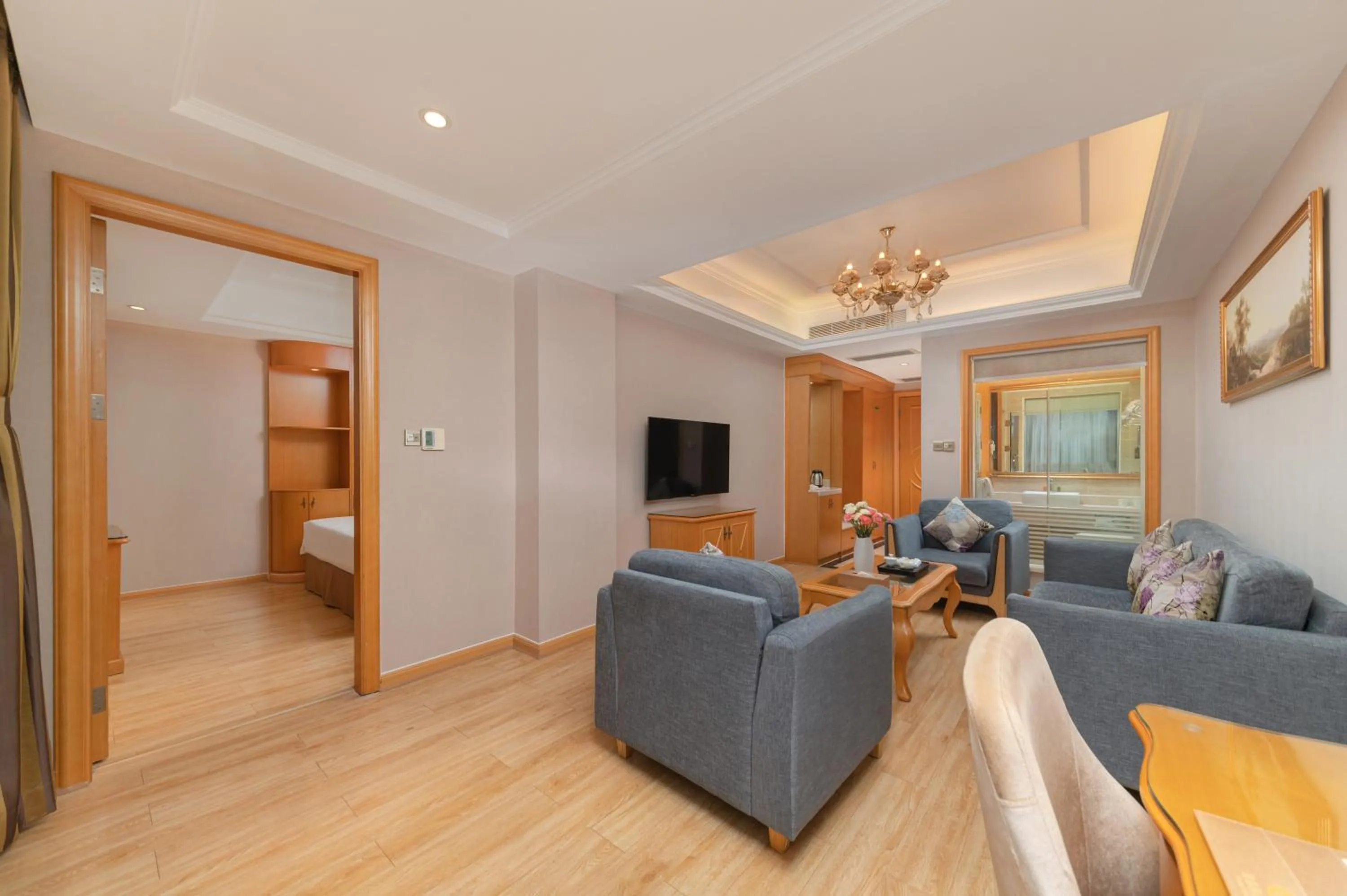 Living room, Bed in Vienna Hotel Shenzhen Fuyong Subway Station