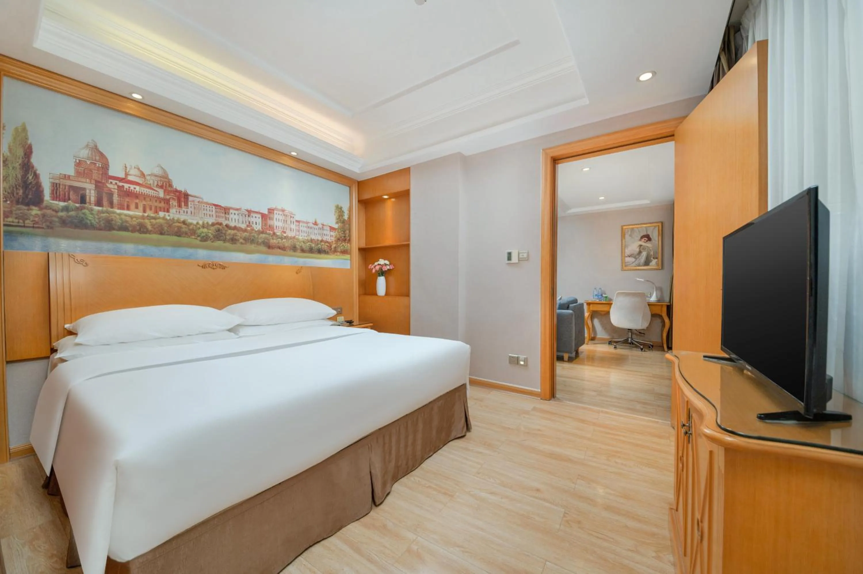 Bed in Vienna Hotel Shenzhen Fuyong Subway Station