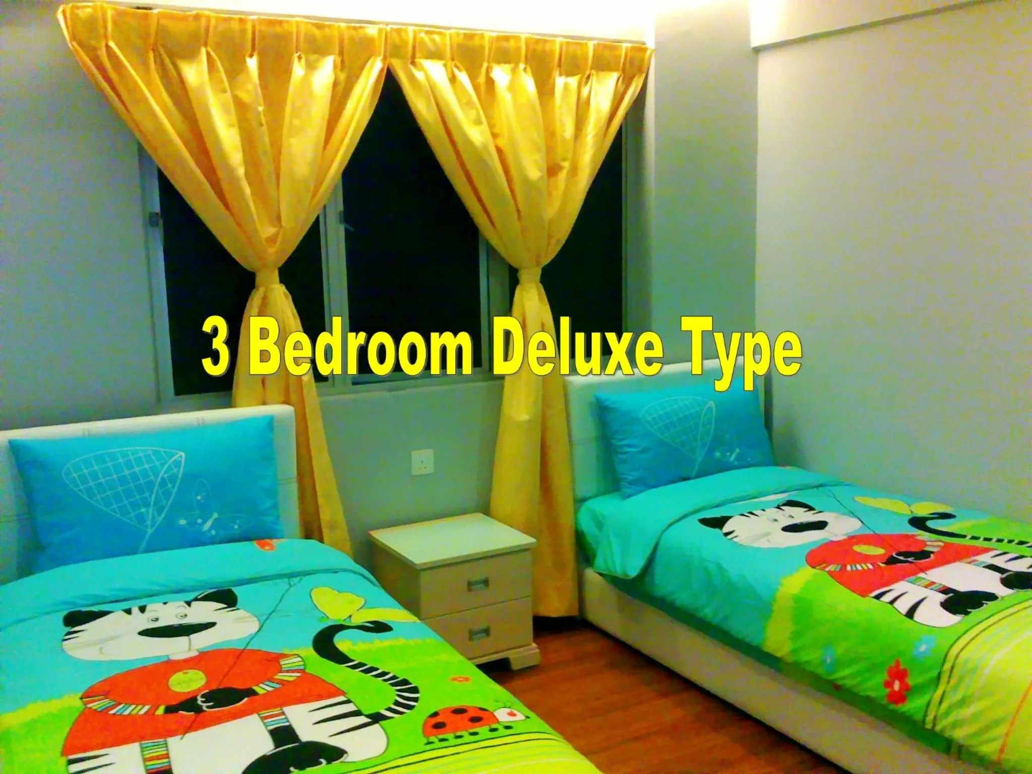 Text overlay, Bed in Malacca Hotel Apartment