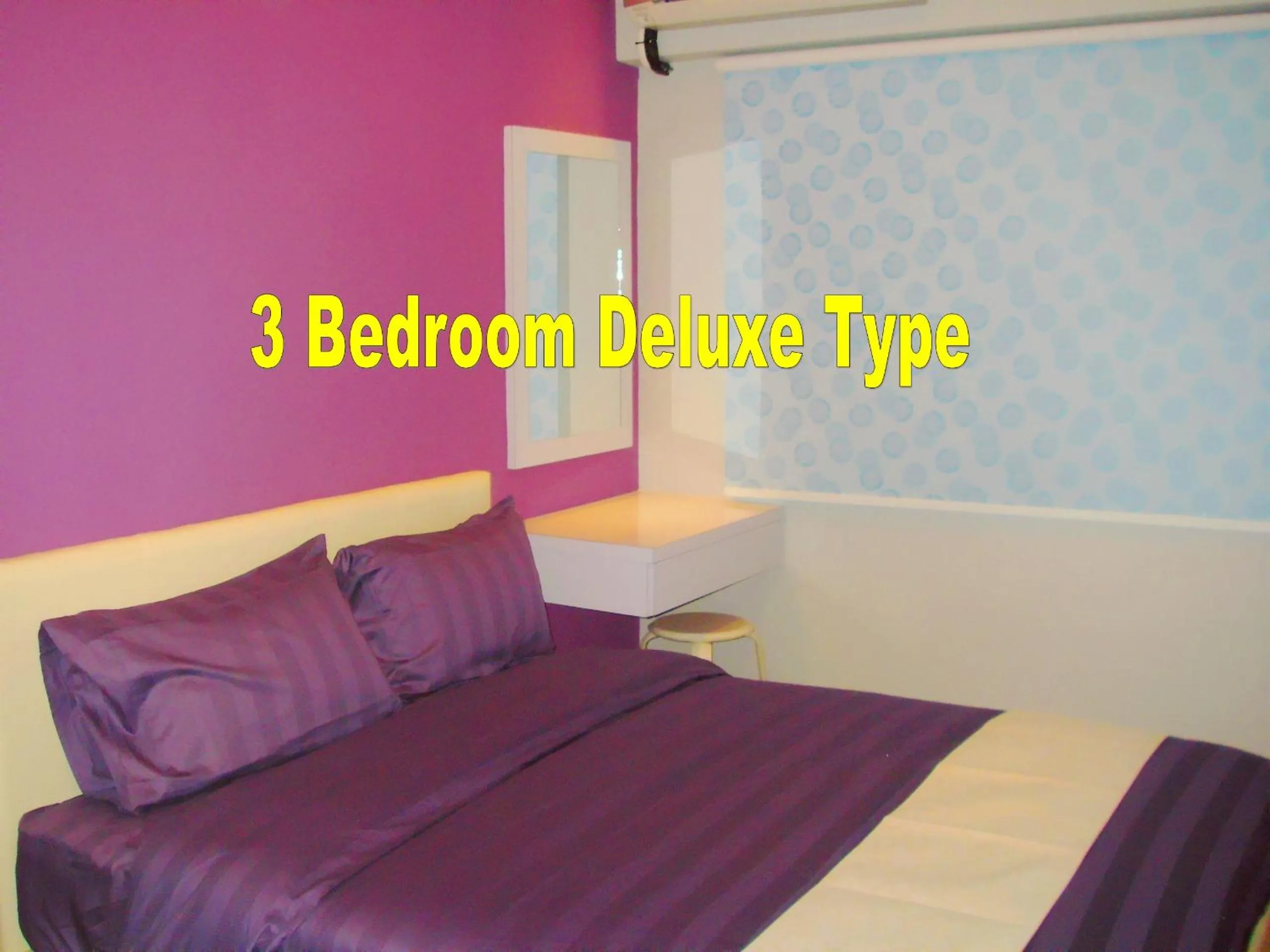 Text overlay, Bed in Malacca Hotel Apartment
