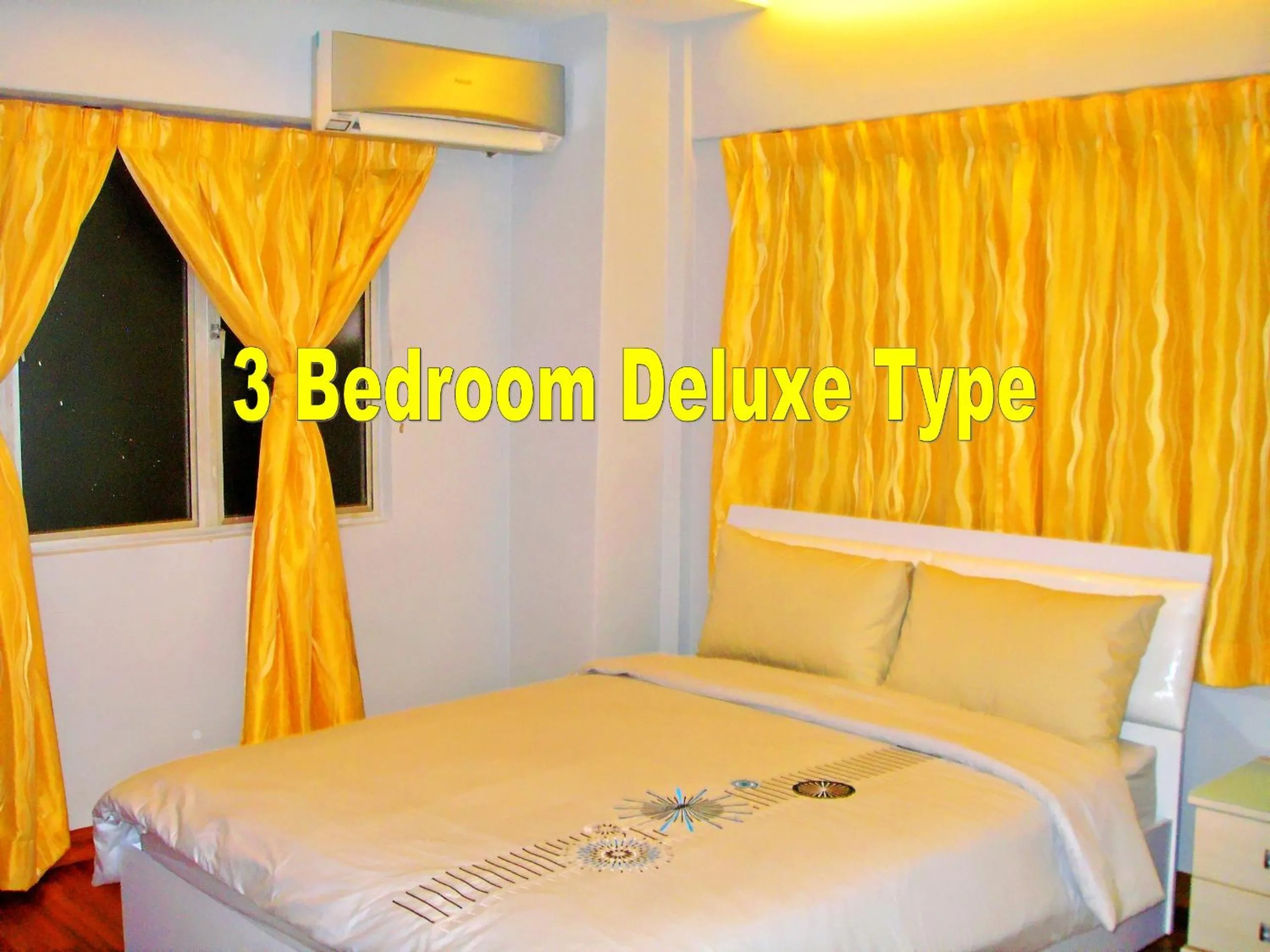 Text overlay, Bed in Malacca Hotel Apartment