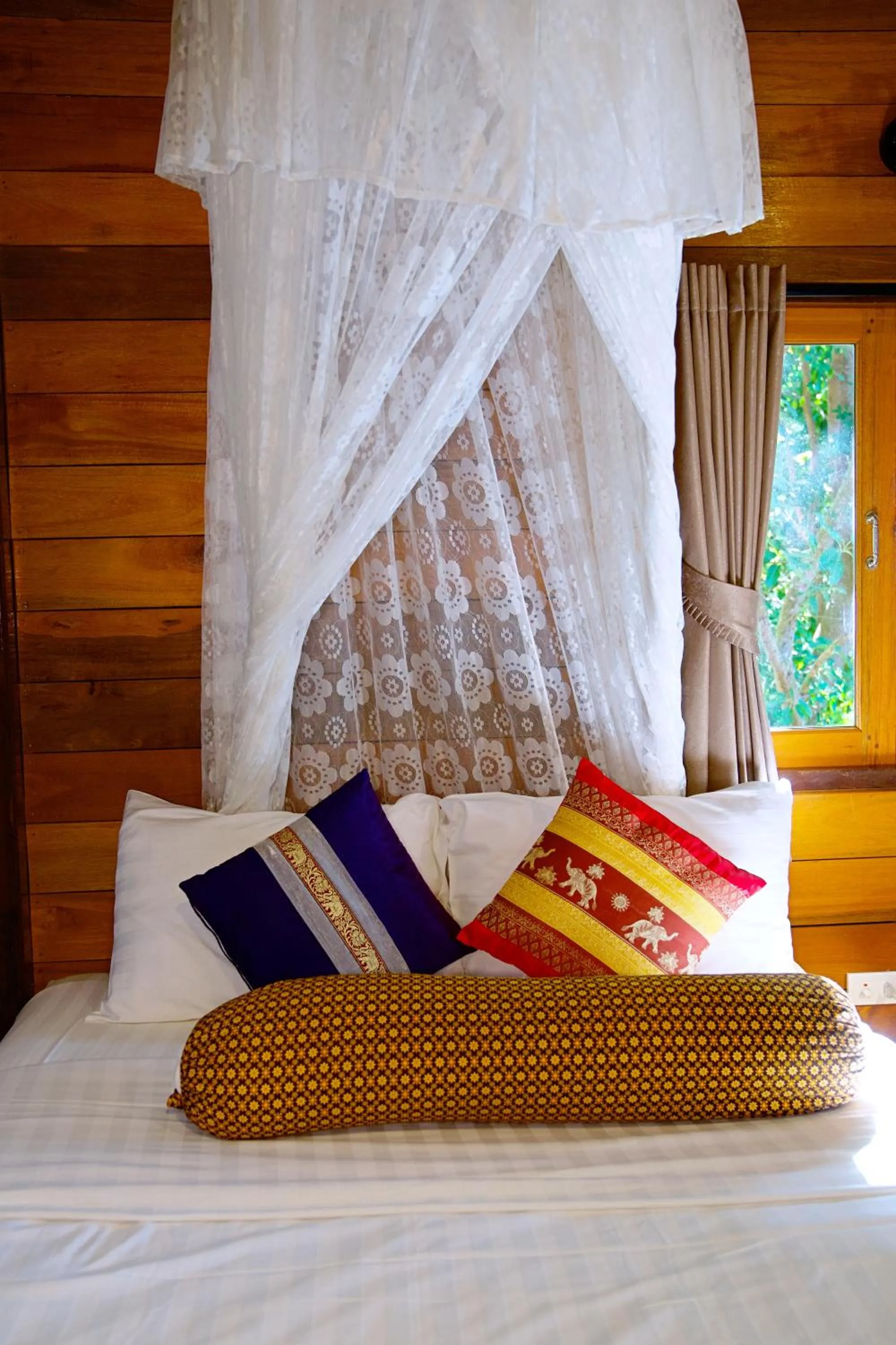 Bed in Sensi Paradise Beach Resort