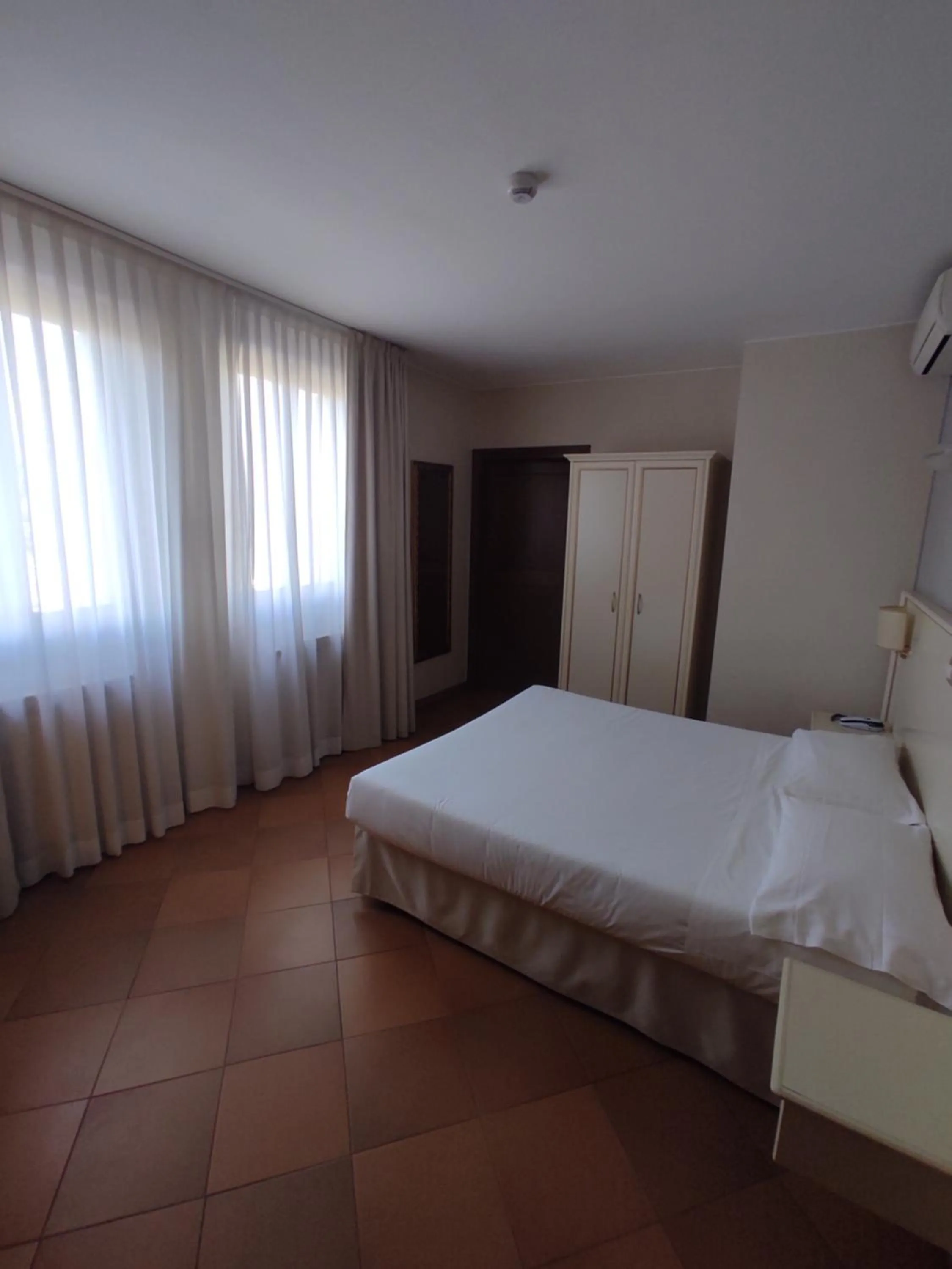 Bed in Hotel Le Mura