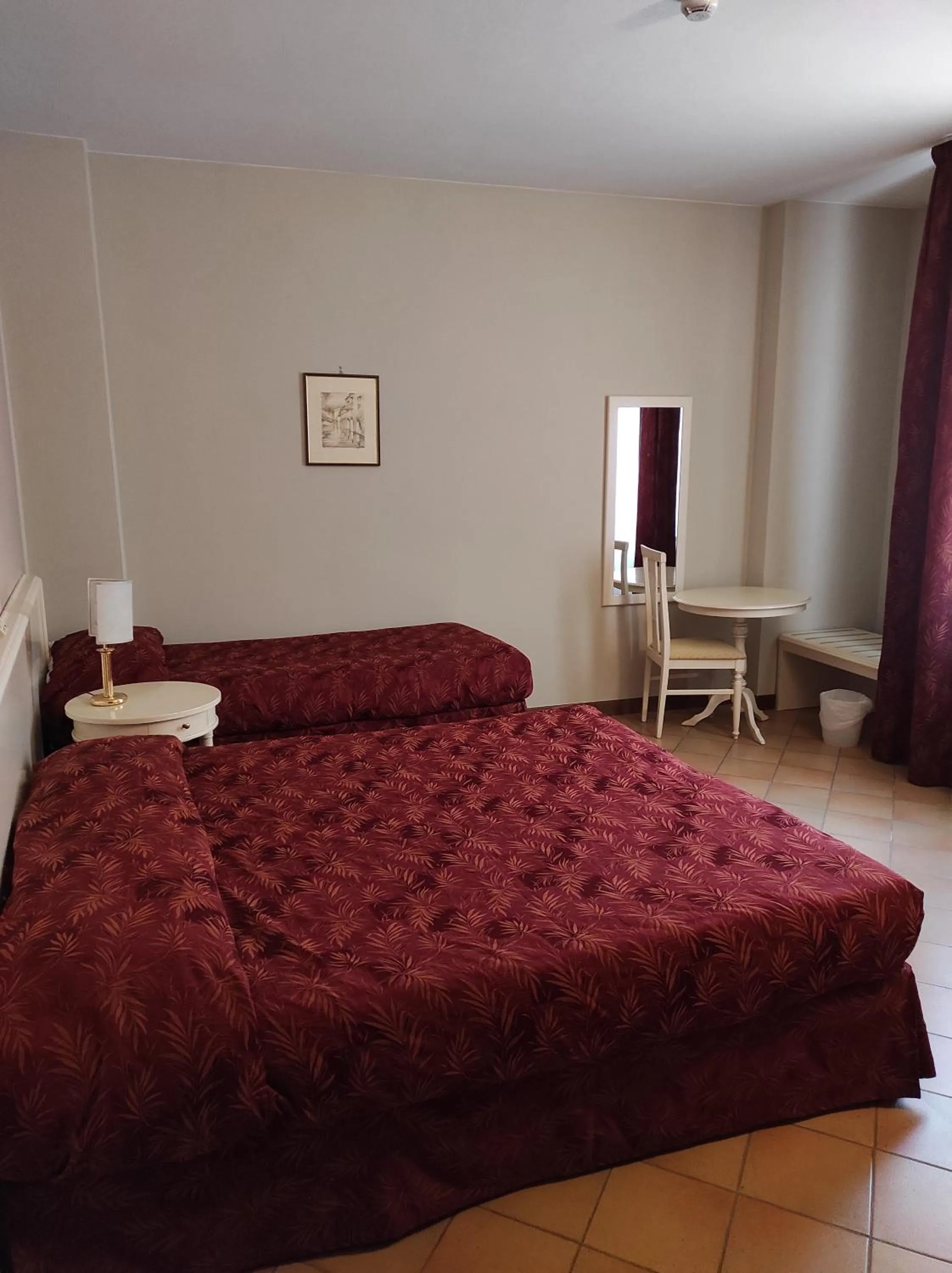 Bed in Hotel Le Mura