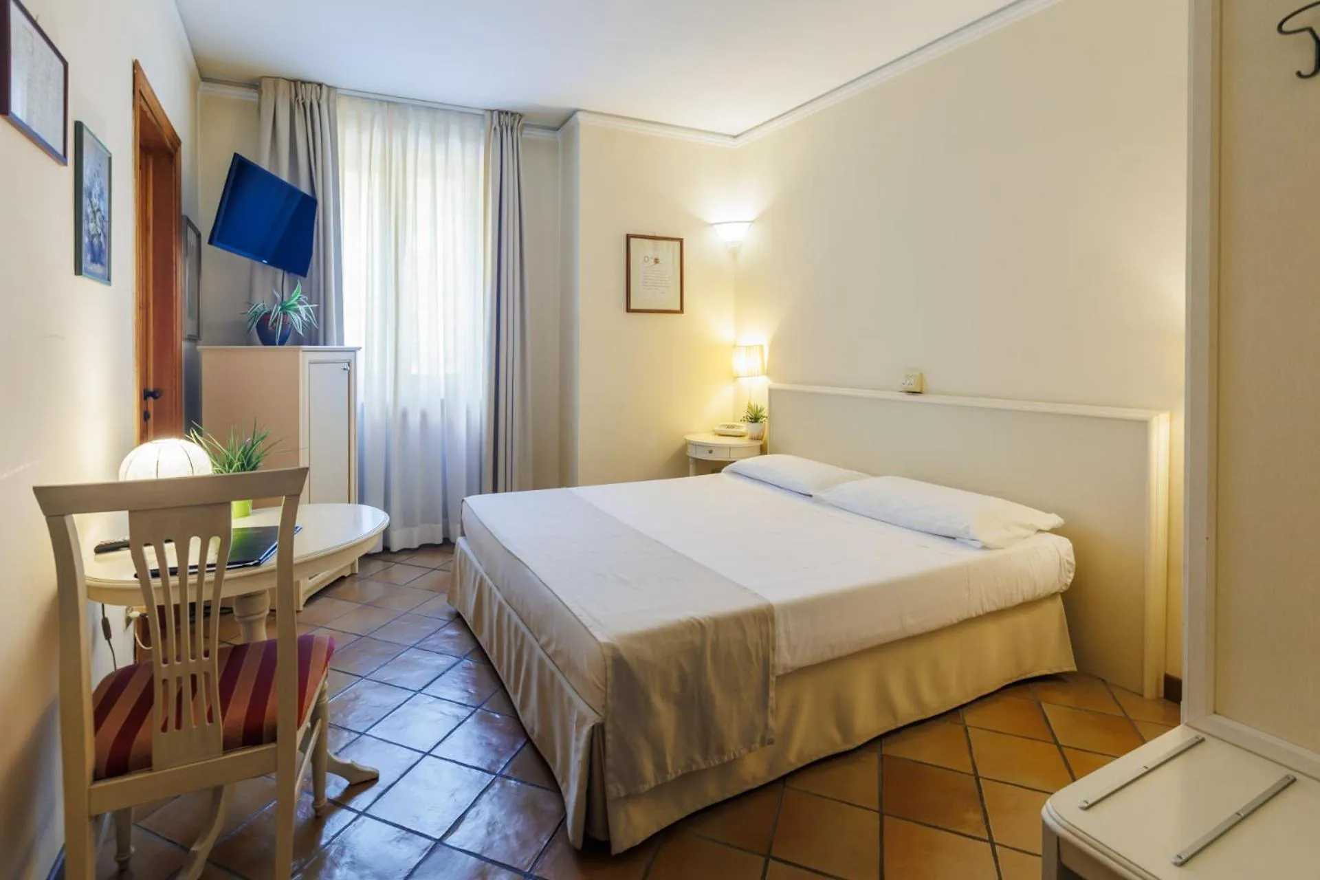 Bed in Hotel Le Mura