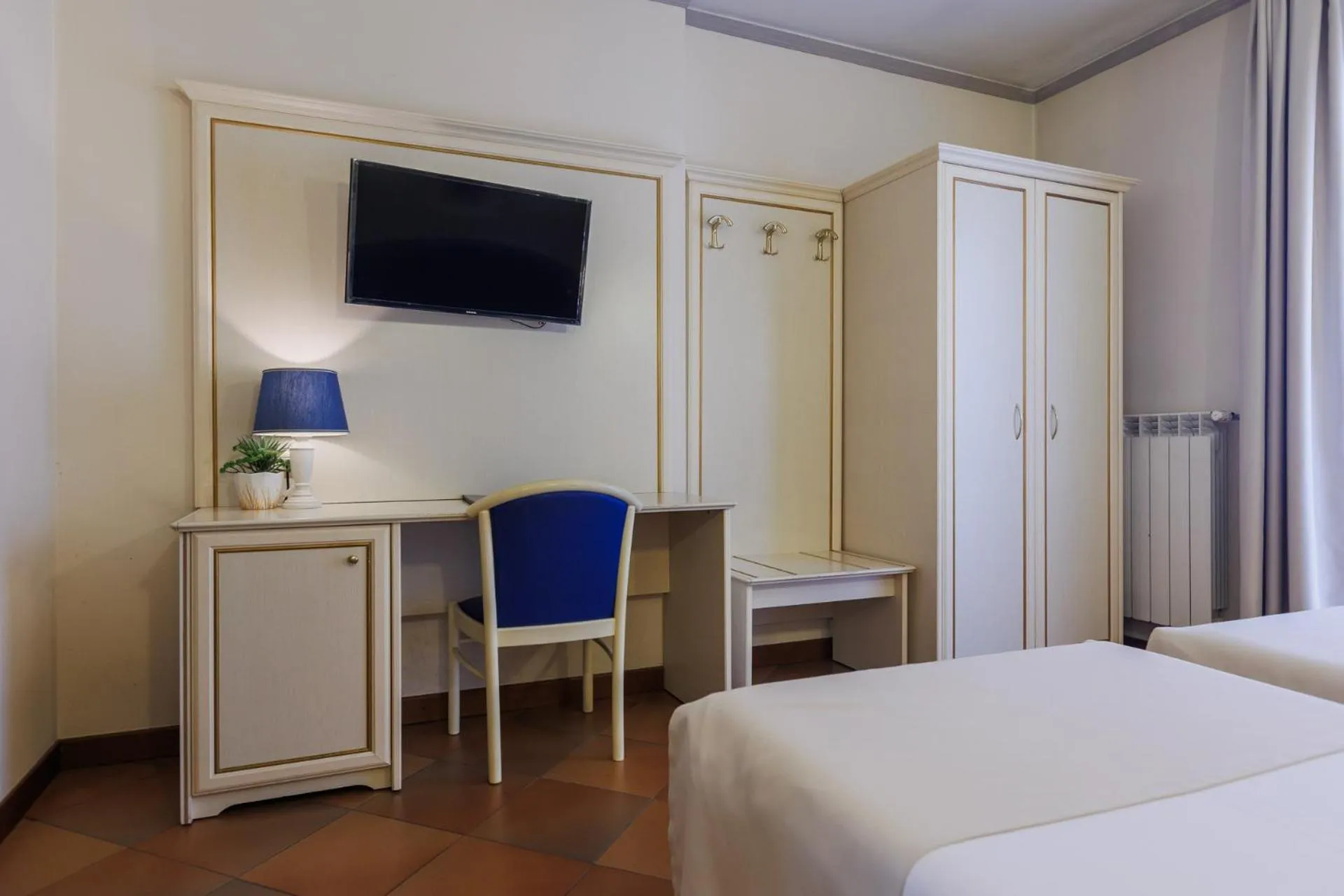 Bed in Hotel Le Mura