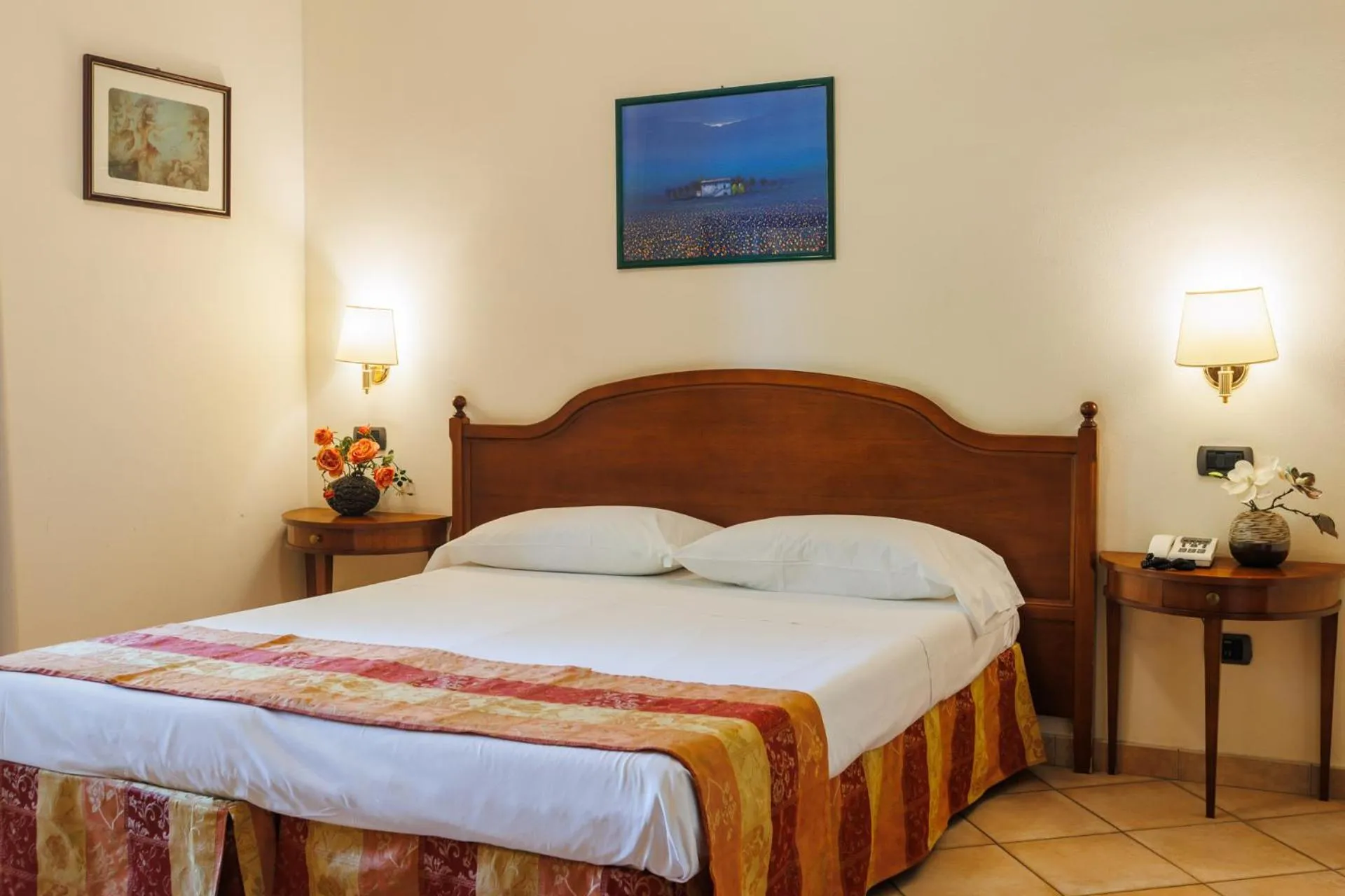 Bed in Hotel Le Mura