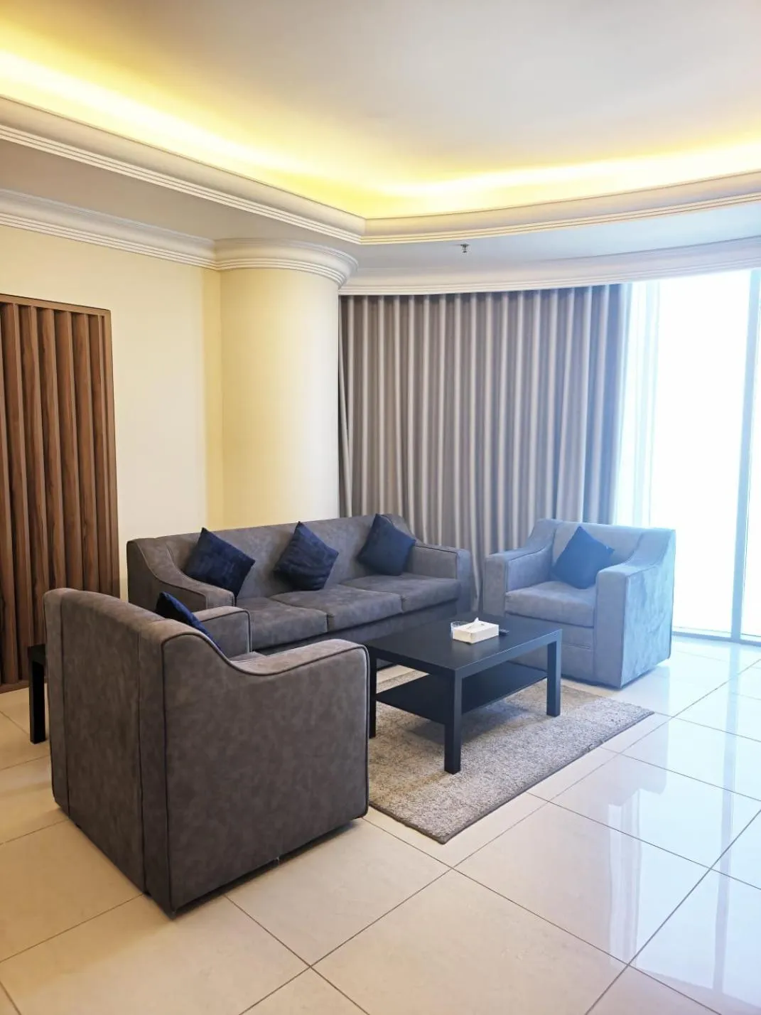 Living room in Costa Del Sol Hotel by Arabian Link