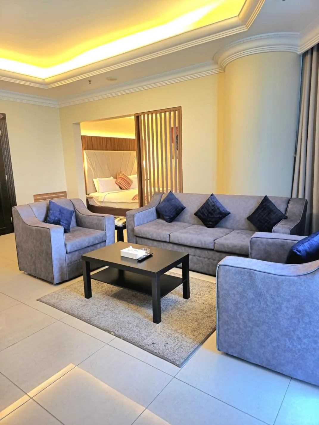 Living room in Costa Del Sol Hotel by Arabian Link