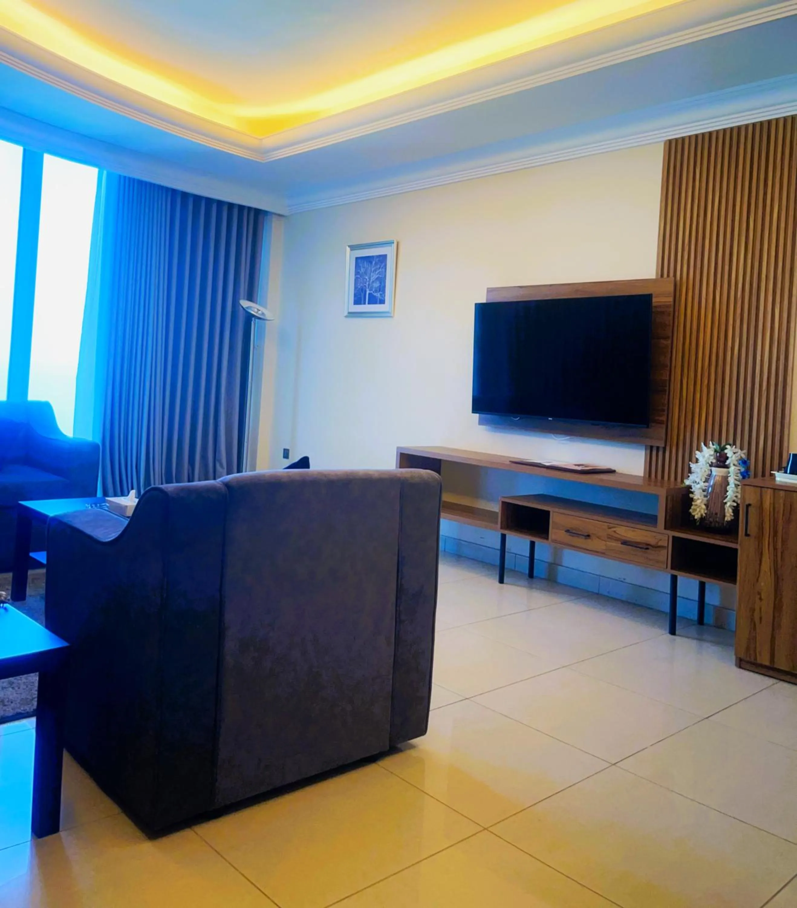 Living room in Costa Del Sol Hotel by Arabian Link