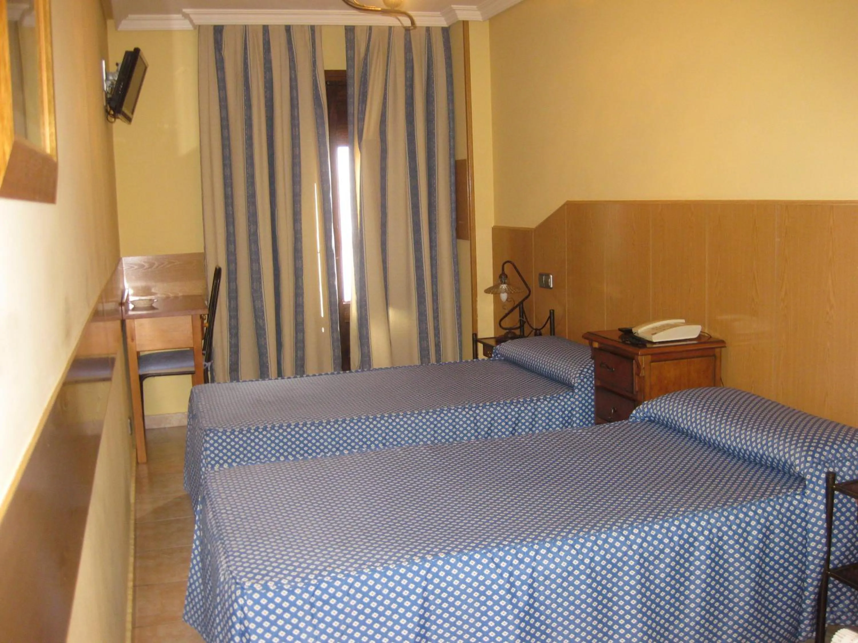 Photo of the whole room, Bed in Hostal Maria Ronda