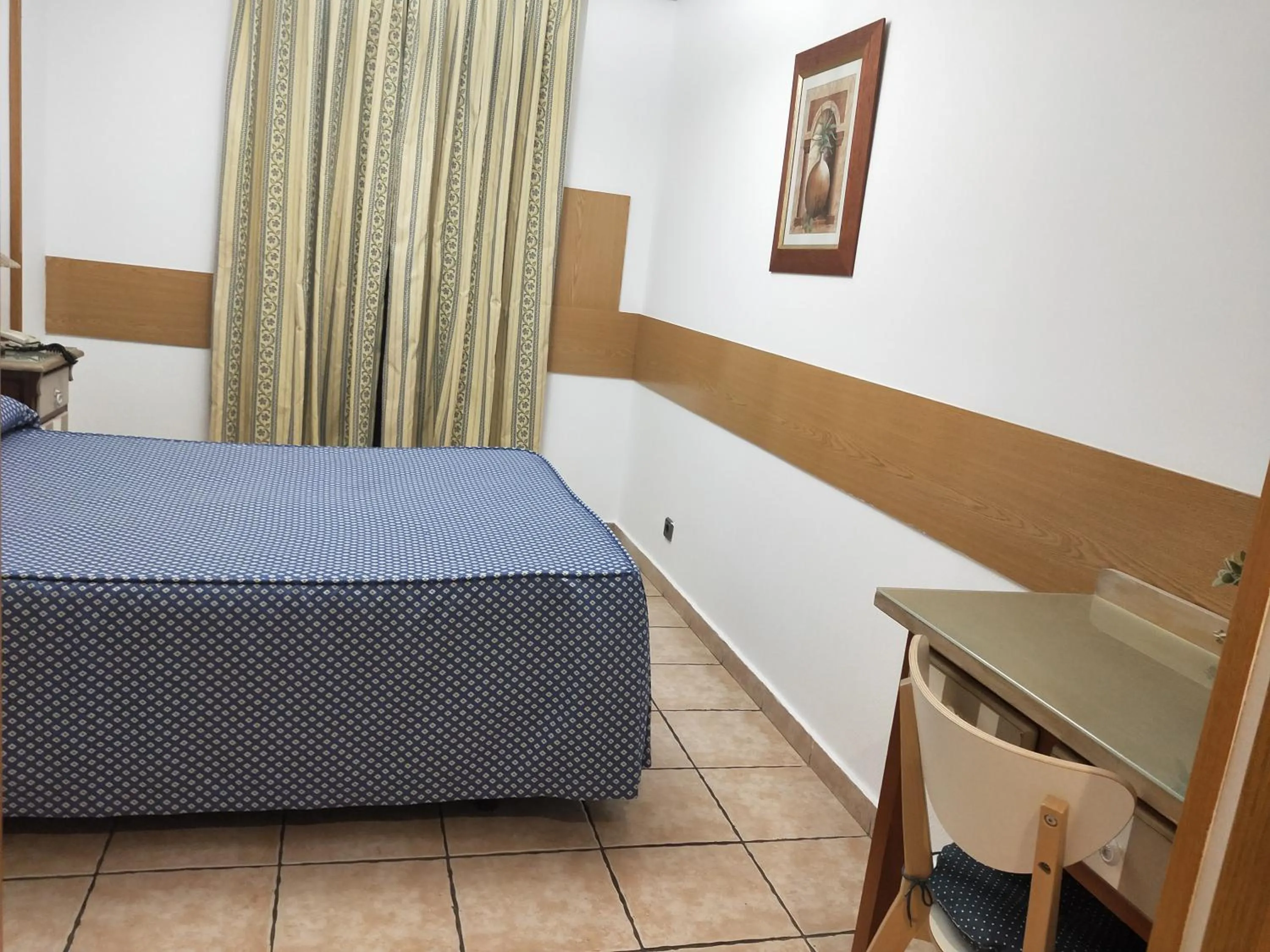 Bed in Hostal Maria Ronda