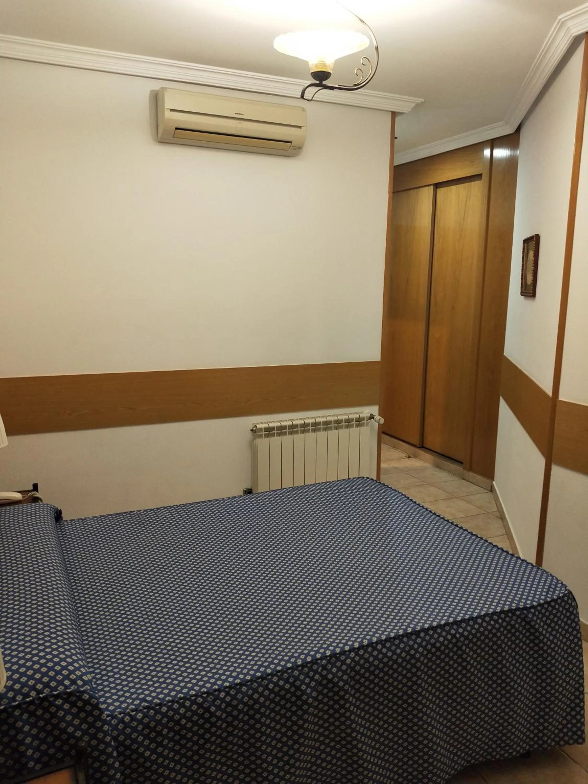 Bed in Hostal Maria Ronda