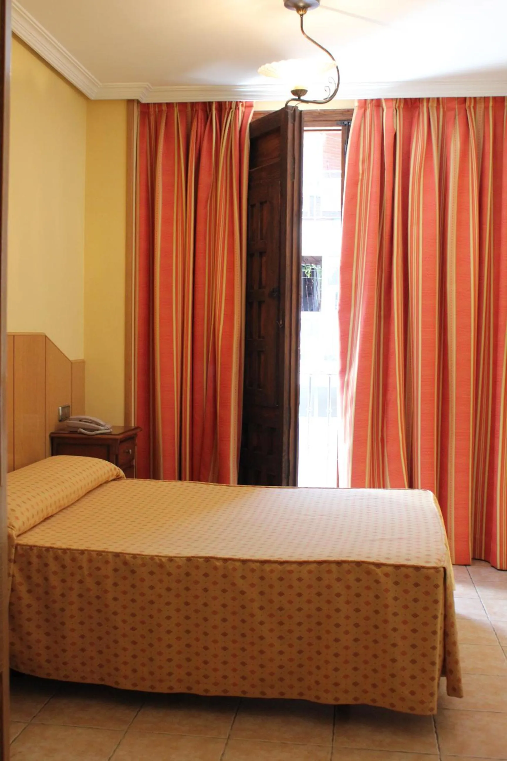 Photo of the whole room, Bed in Hostal Maria Ronda