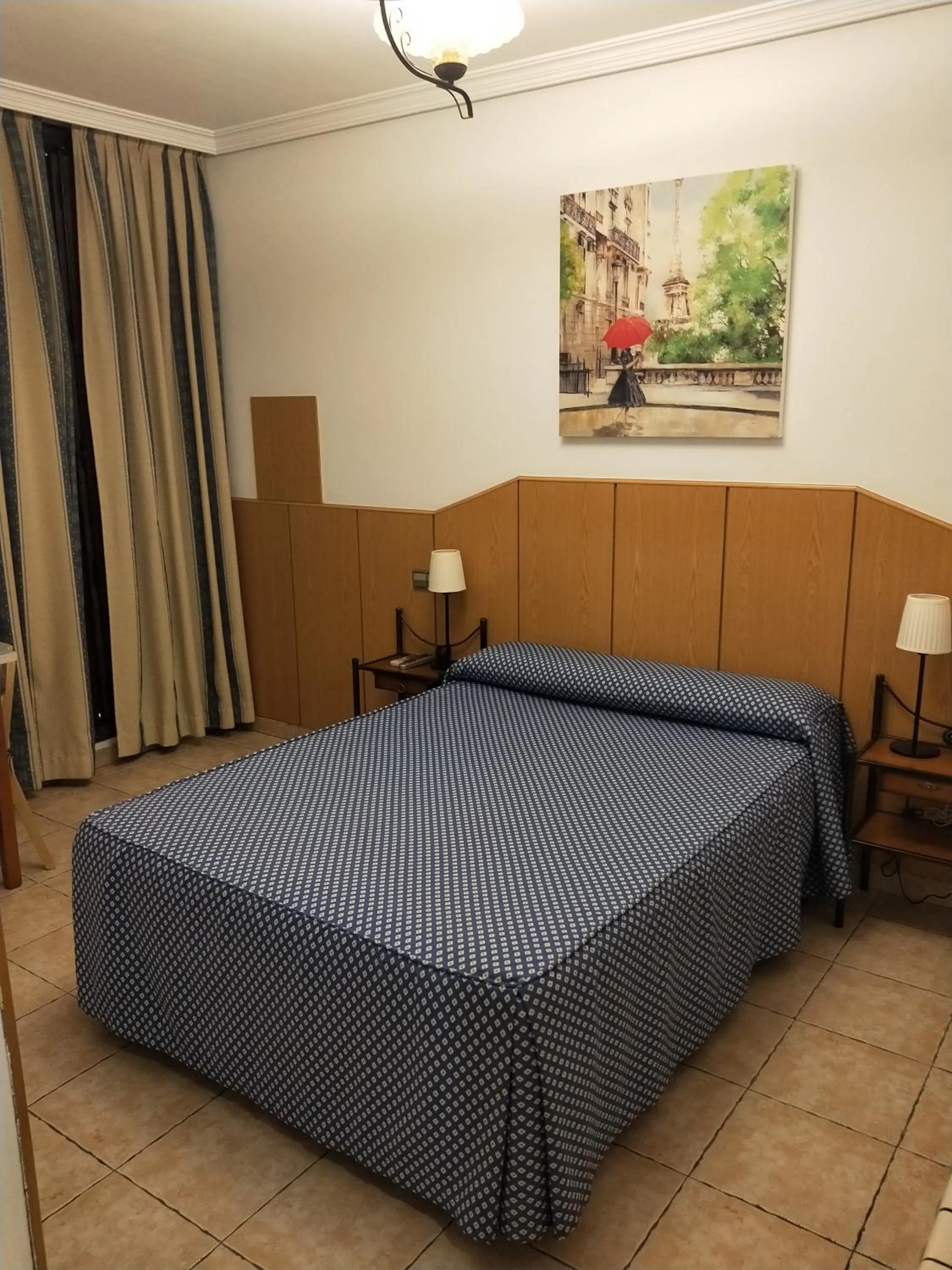 Bed in Hostal Maria Ronda