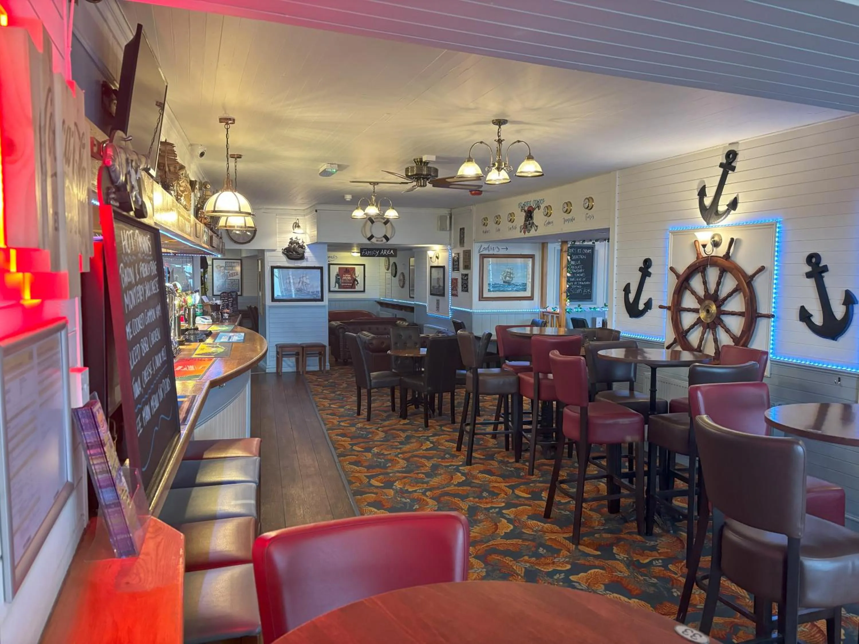 Lounge or bar in The Buccaneer Inn