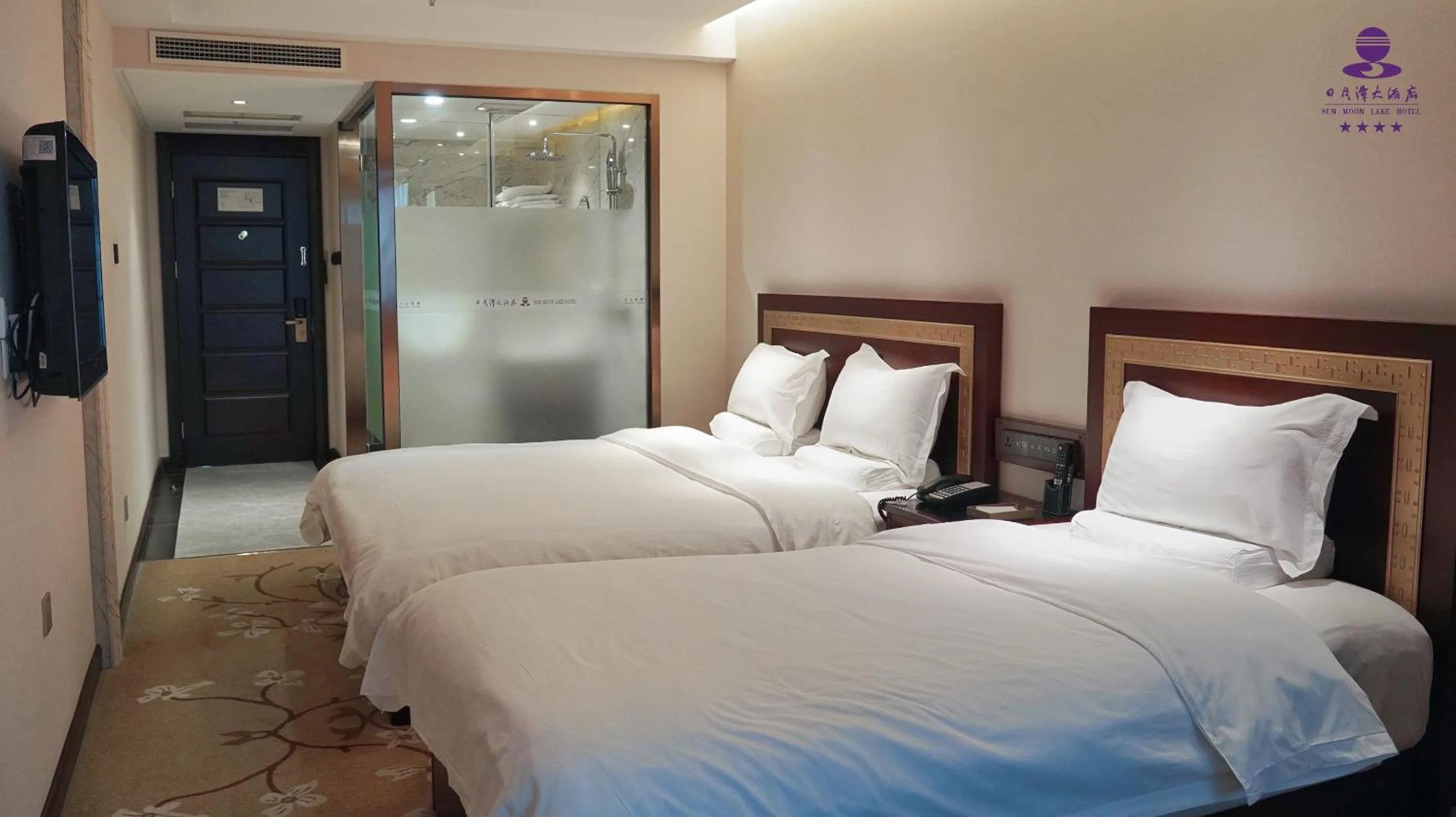 Bed in Sun Moon Lake Hotel Dalian大连火车站店