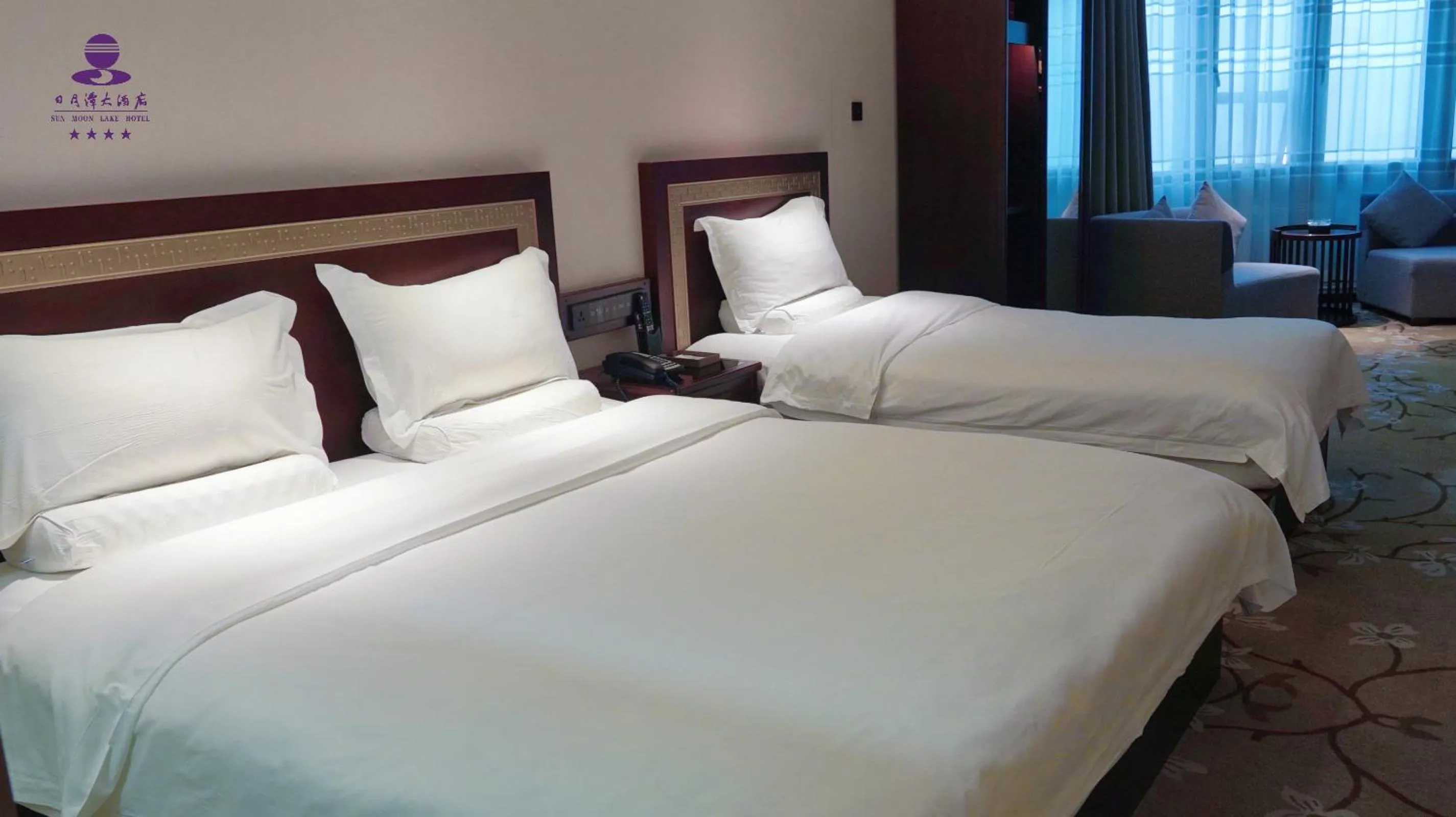 Bed in Sun Moon Lake Hotel Dalian大连火车站店