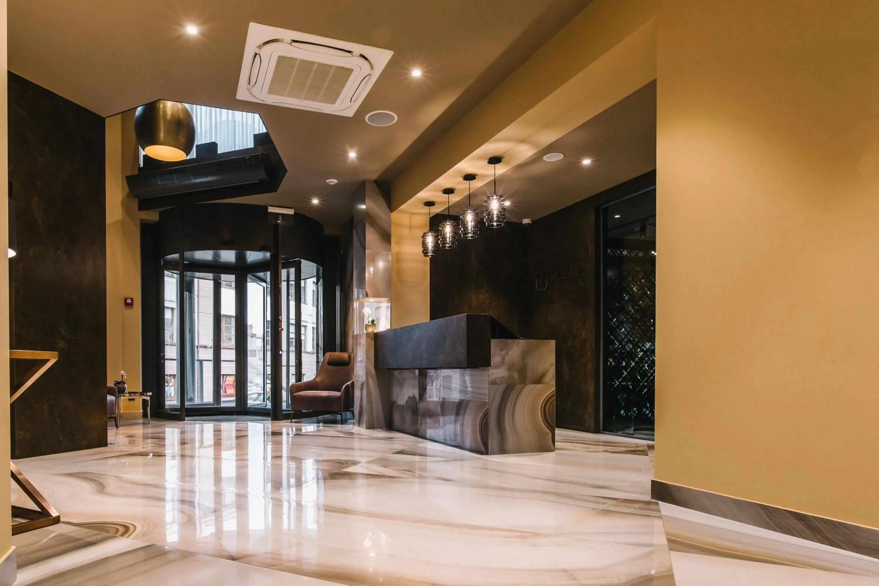 Lobby or reception in Noble Boutique Hotel
