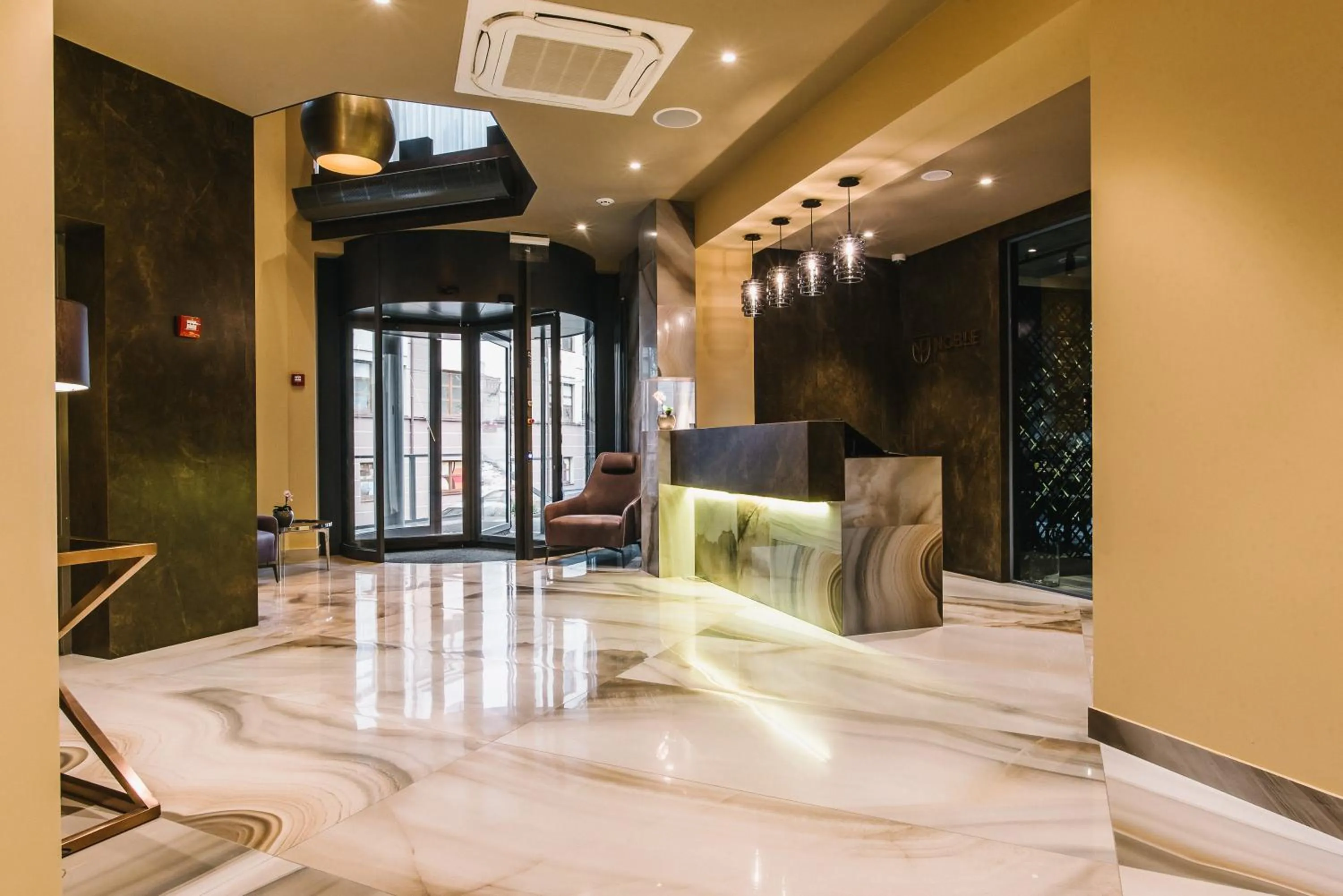 Lobby or reception in Noble Boutique Hotel
