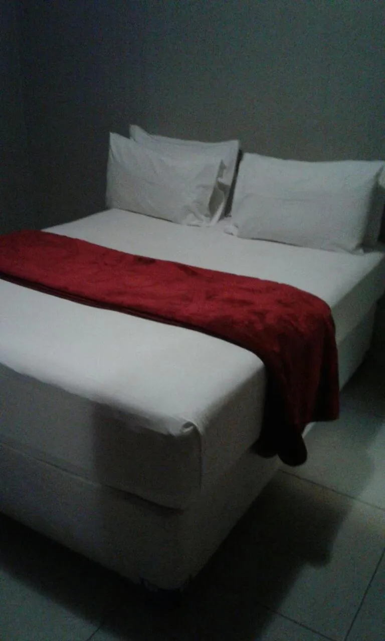 Bed in Central Lodge Hotels