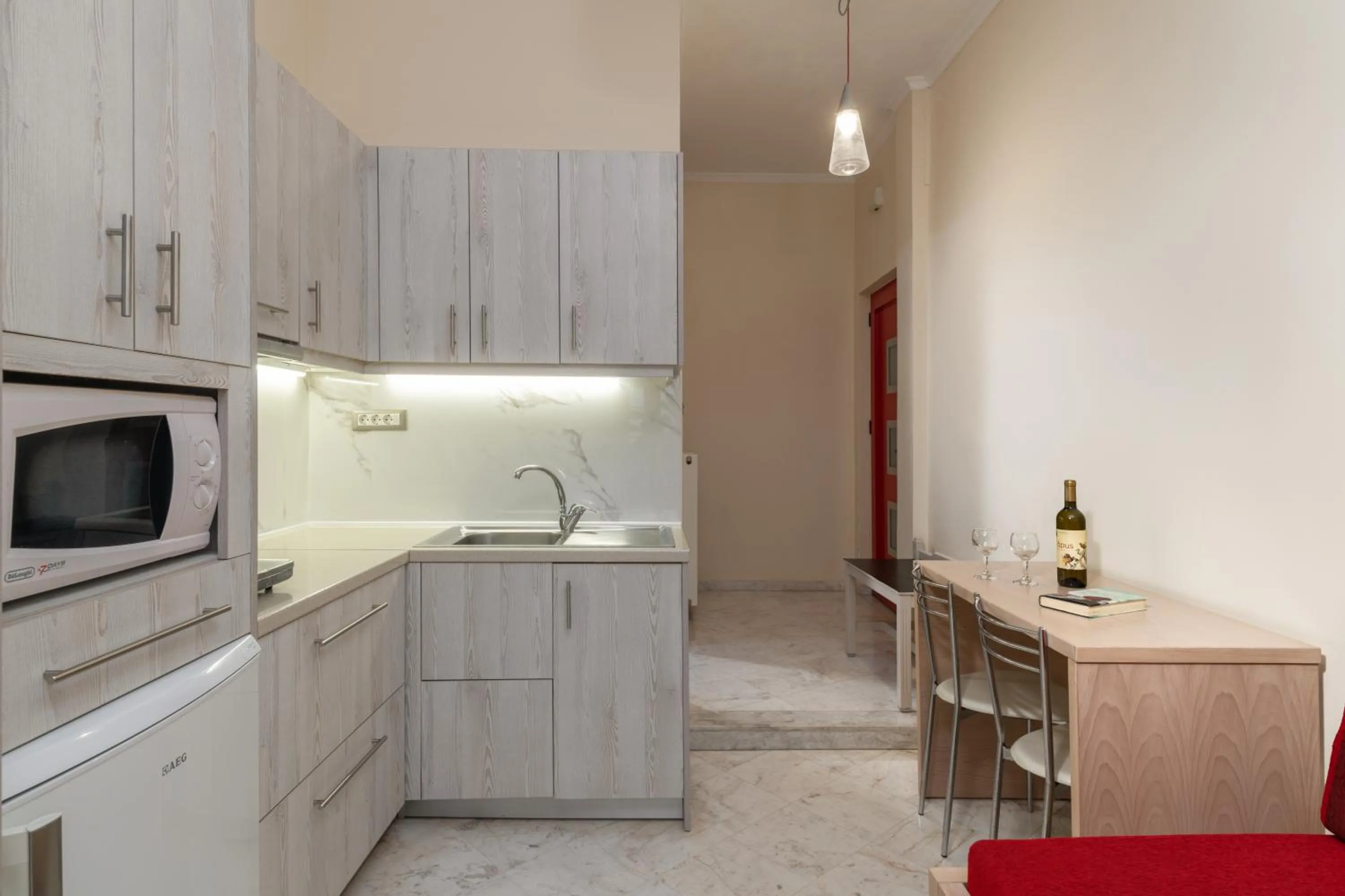 Kitchen or kitchenette in Sevach Apartments