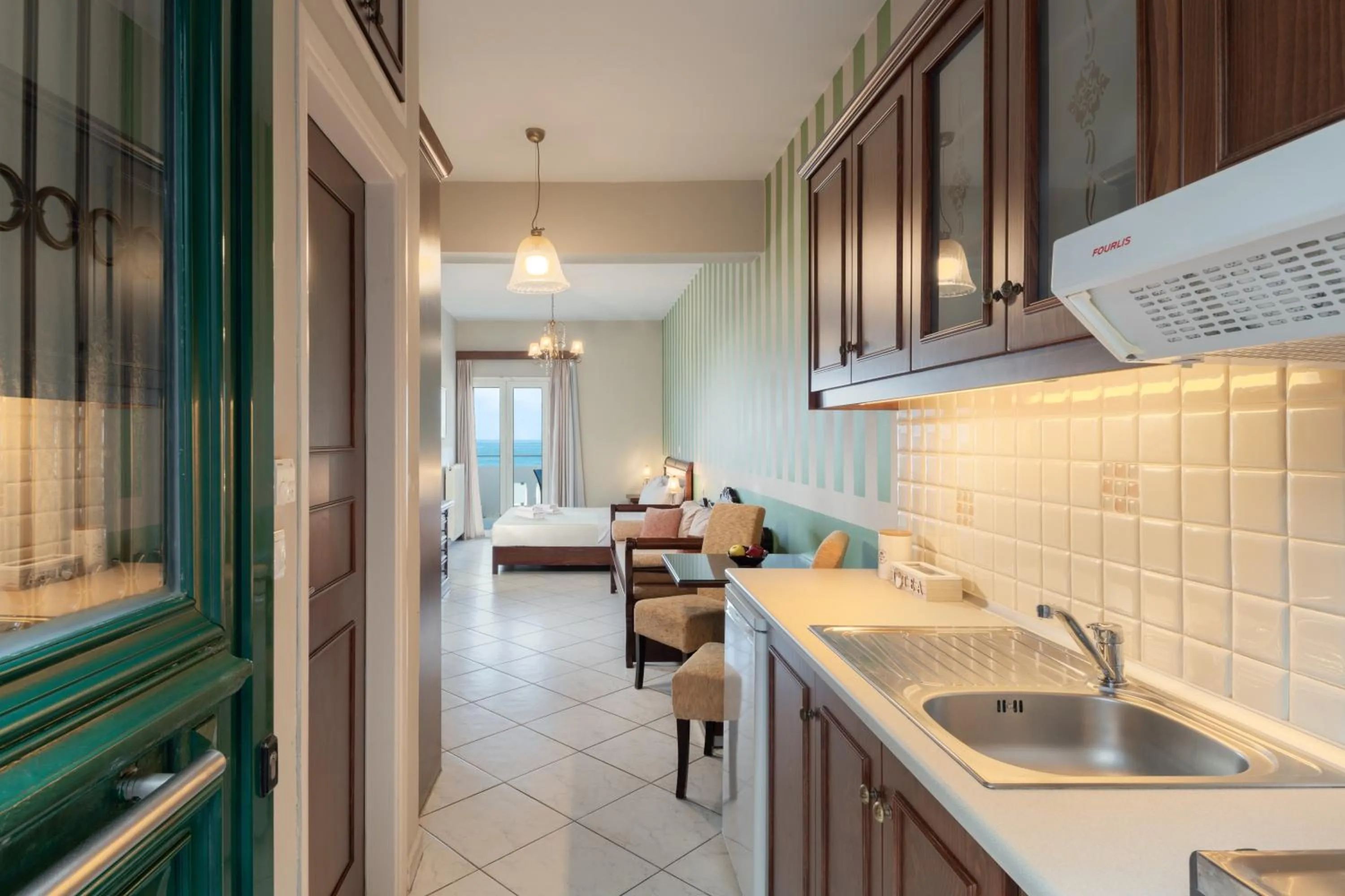 Kitchen or kitchenette in Sevach Apartments