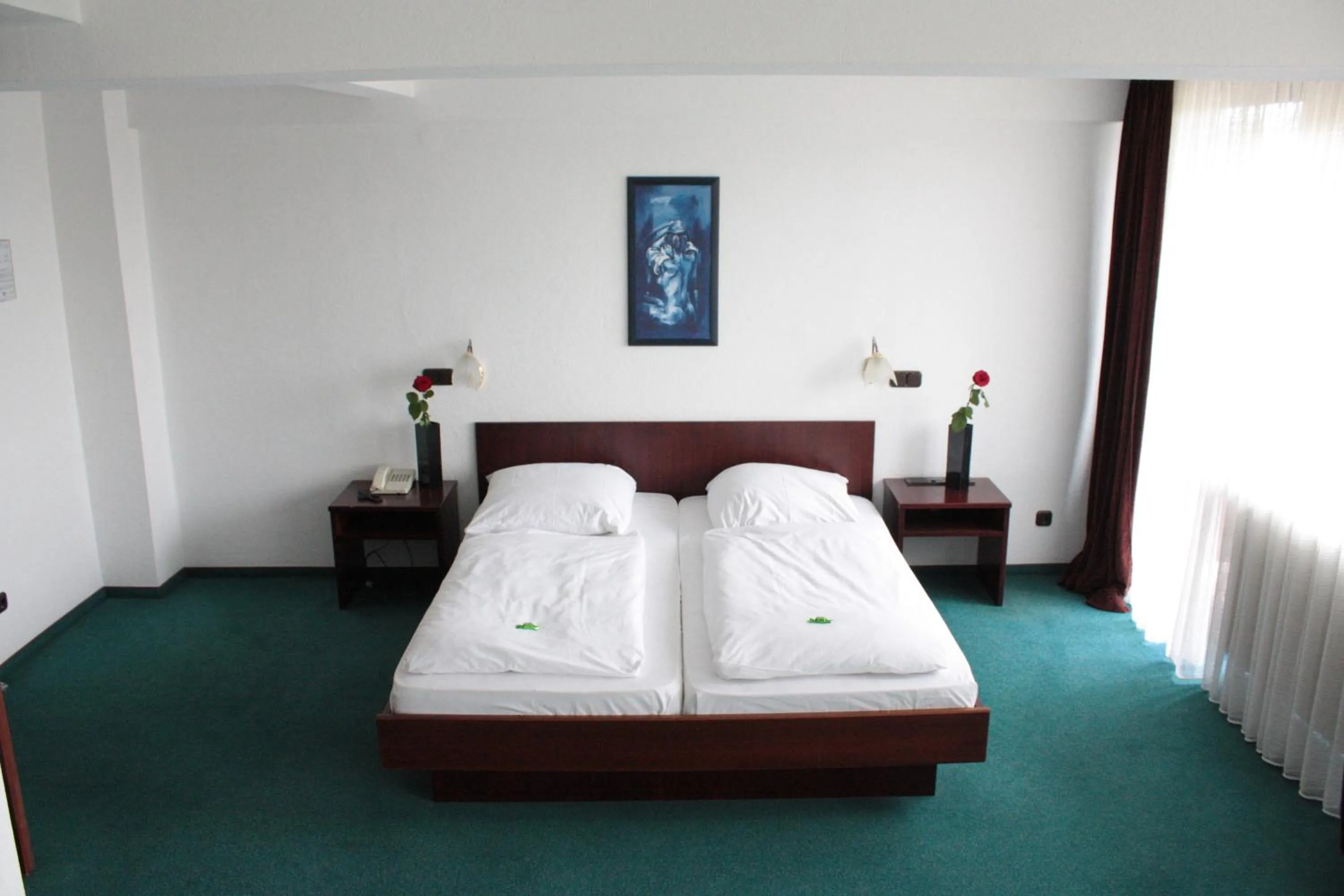 Bed in Hotel Mainbogen