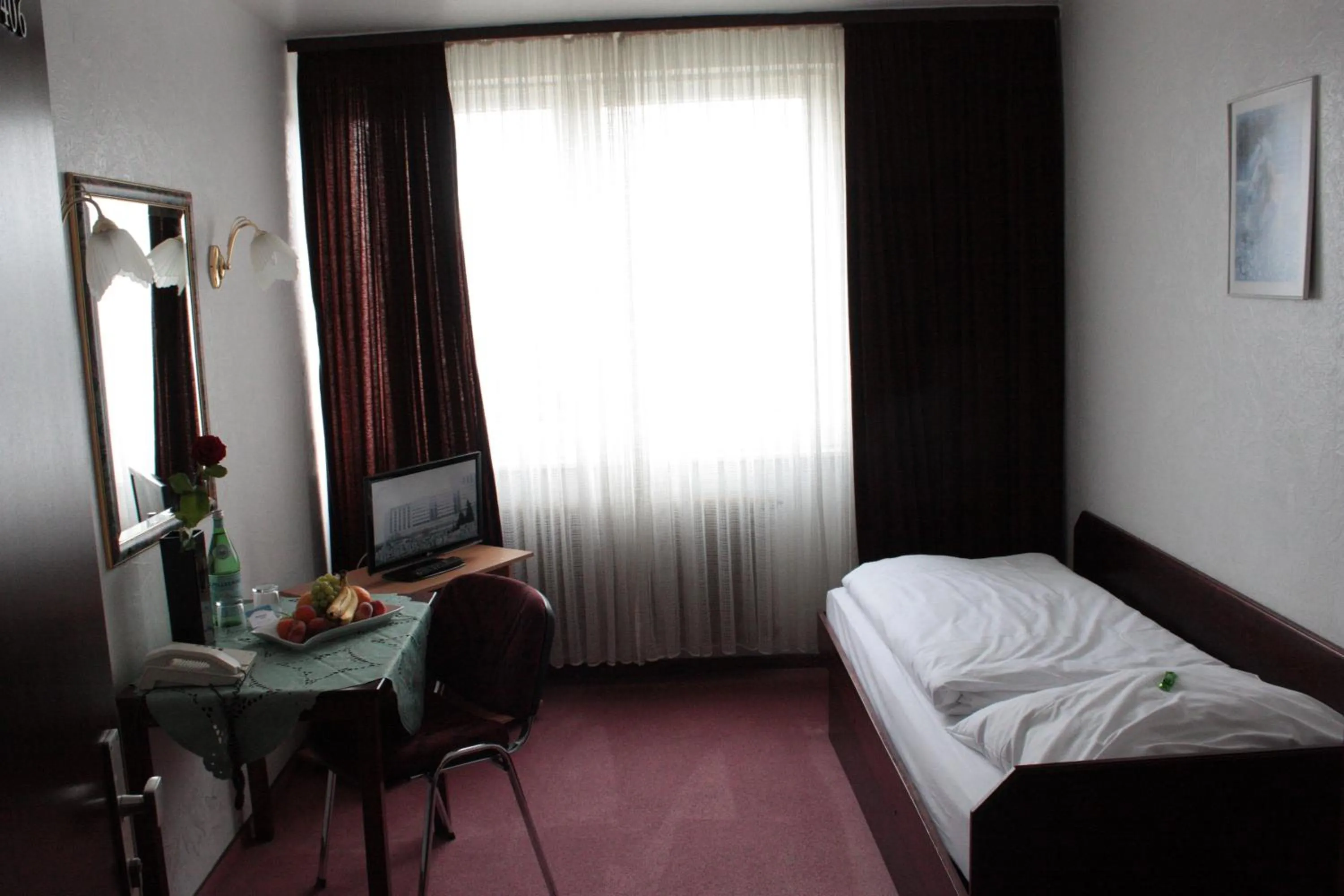 Bed in Hotel Mainbogen