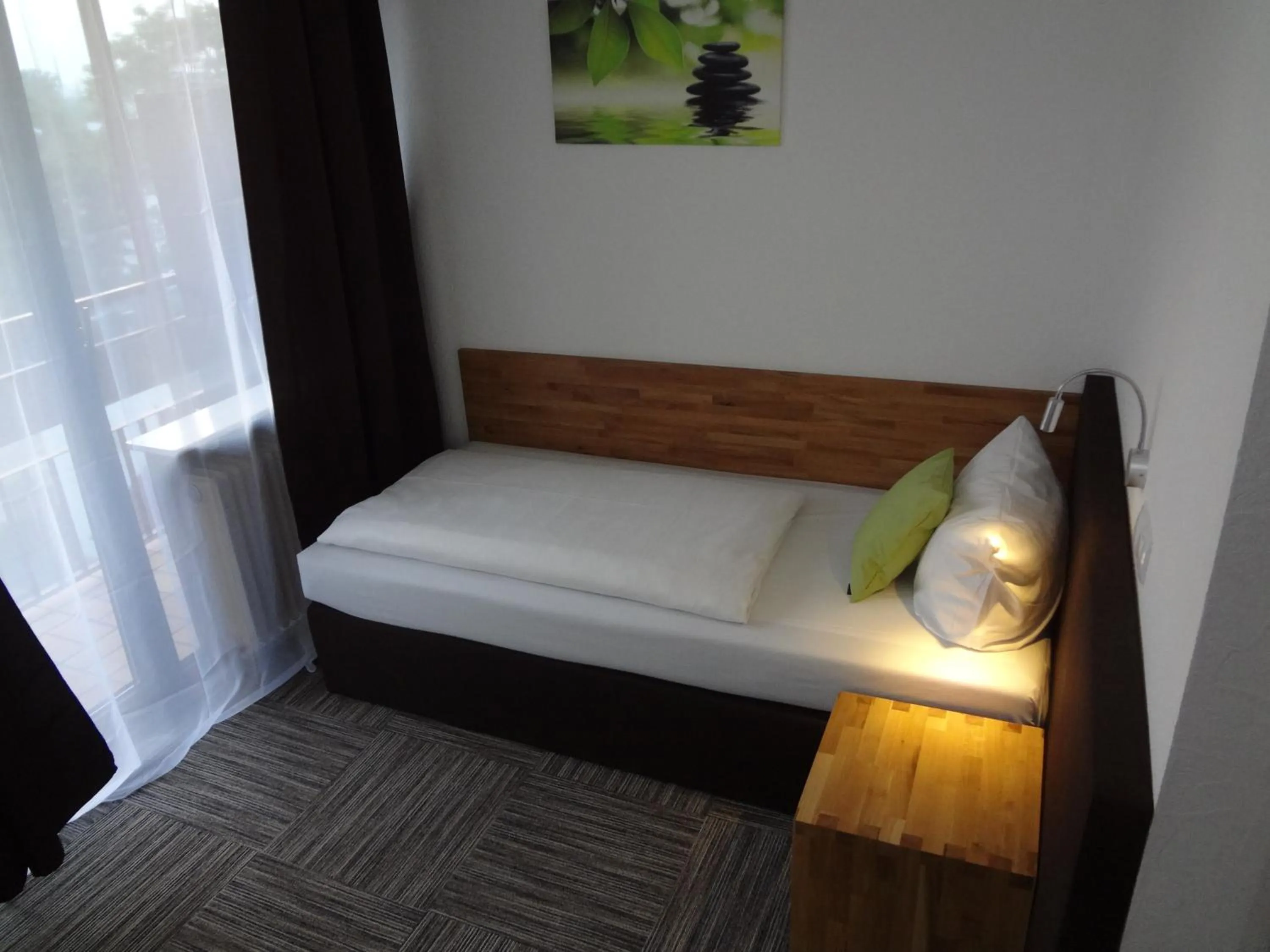 Bed in Hotel Mainbogen