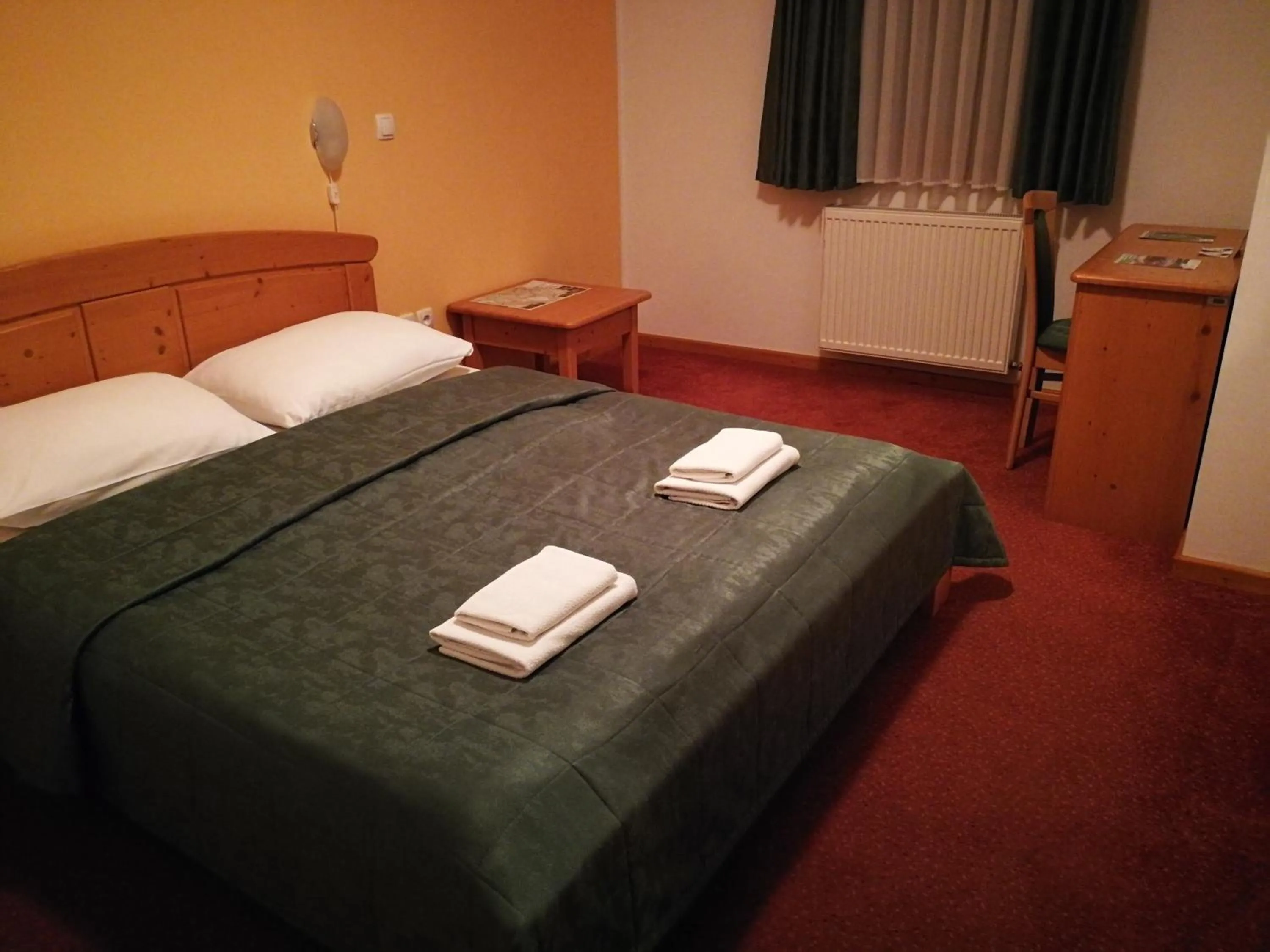 Bed in Hotel Rakov Skocjan