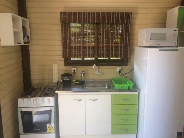 Kitchen or kitchenette in Vila dos Coqueiros