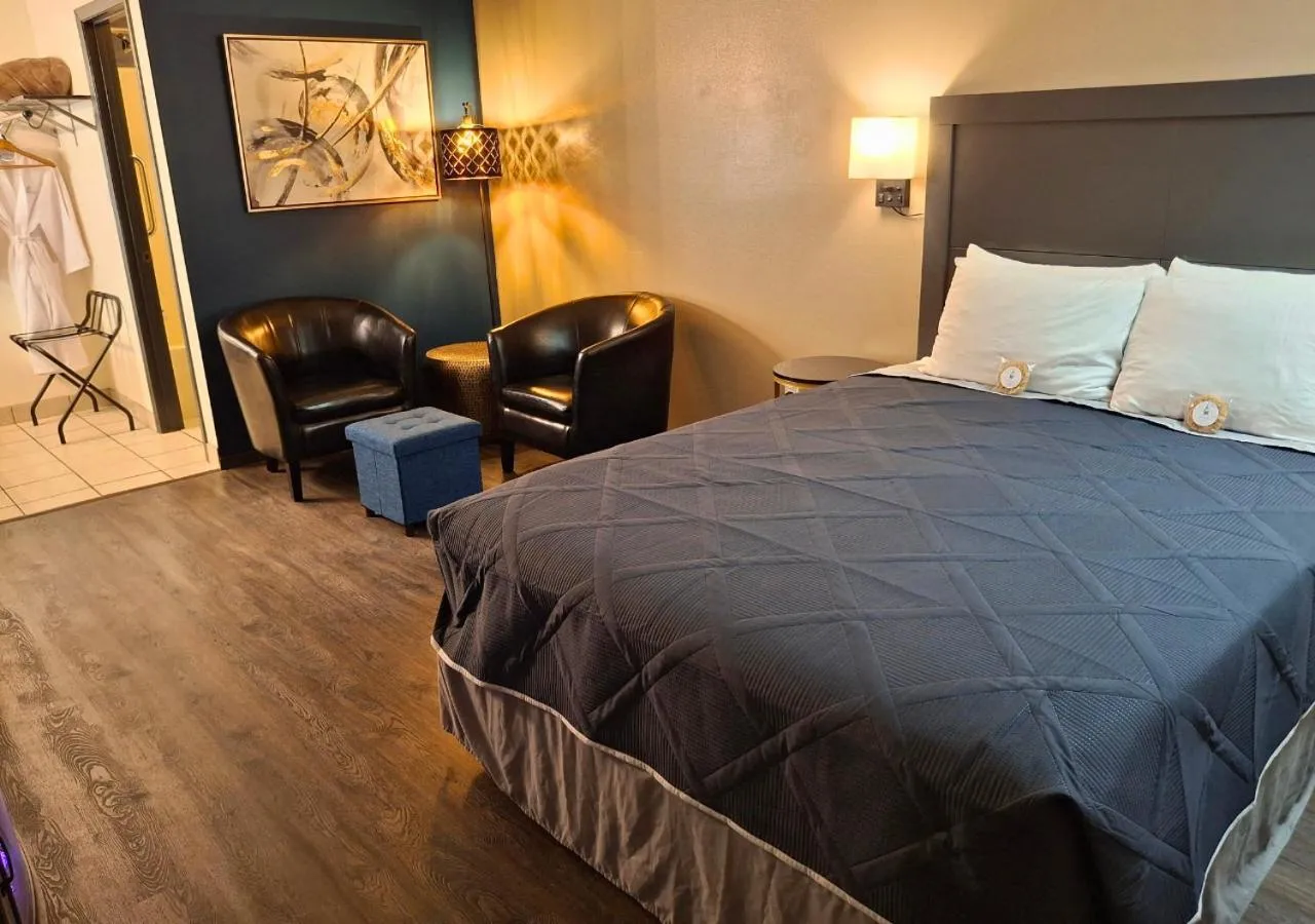 Bed in Shady Acre Inn and Suites