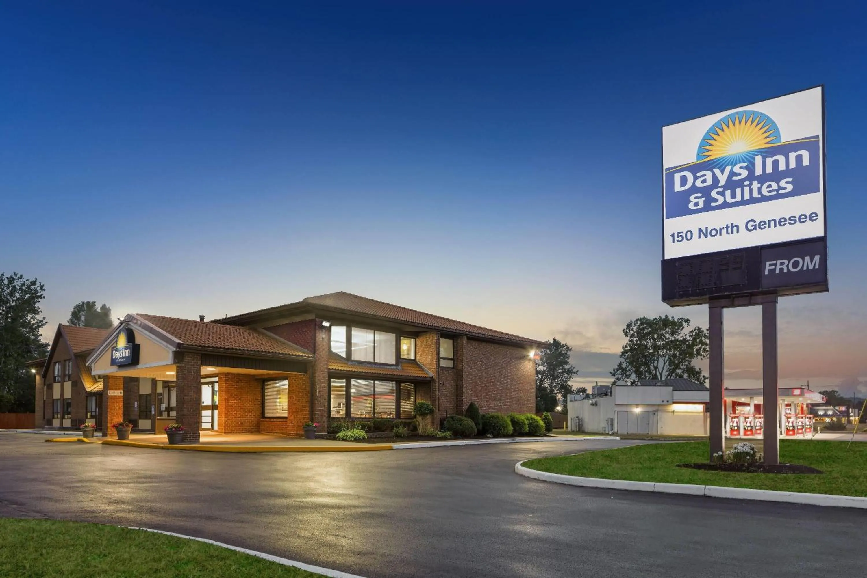 Property building in Days Inn by Wyndham Utica