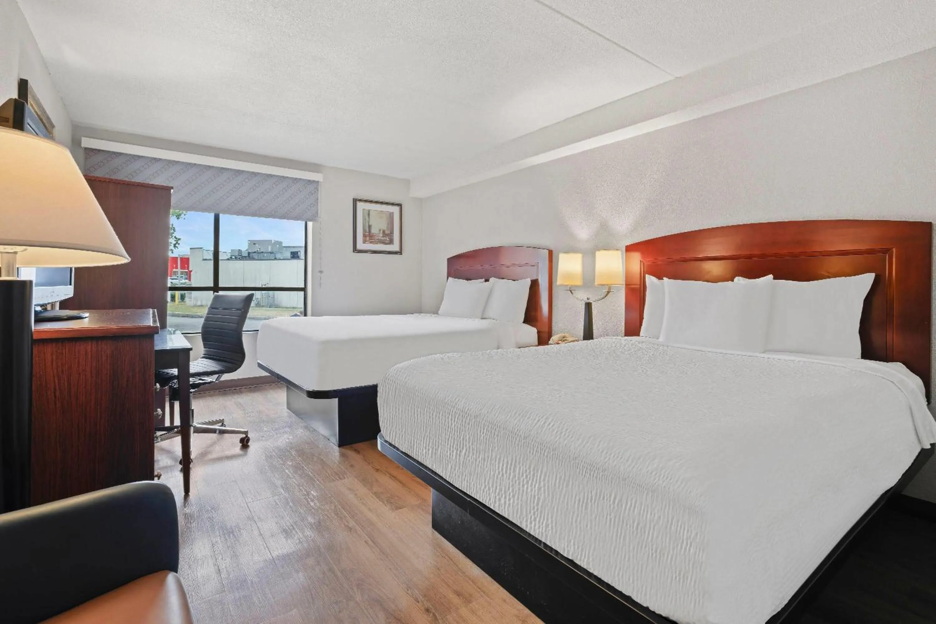 Bed in Days Inn by Wyndham Utica