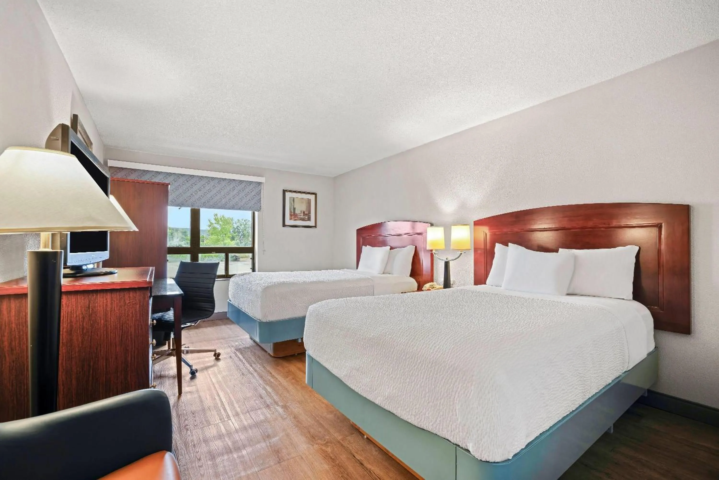 Bed in Days Inn by Wyndham Utica