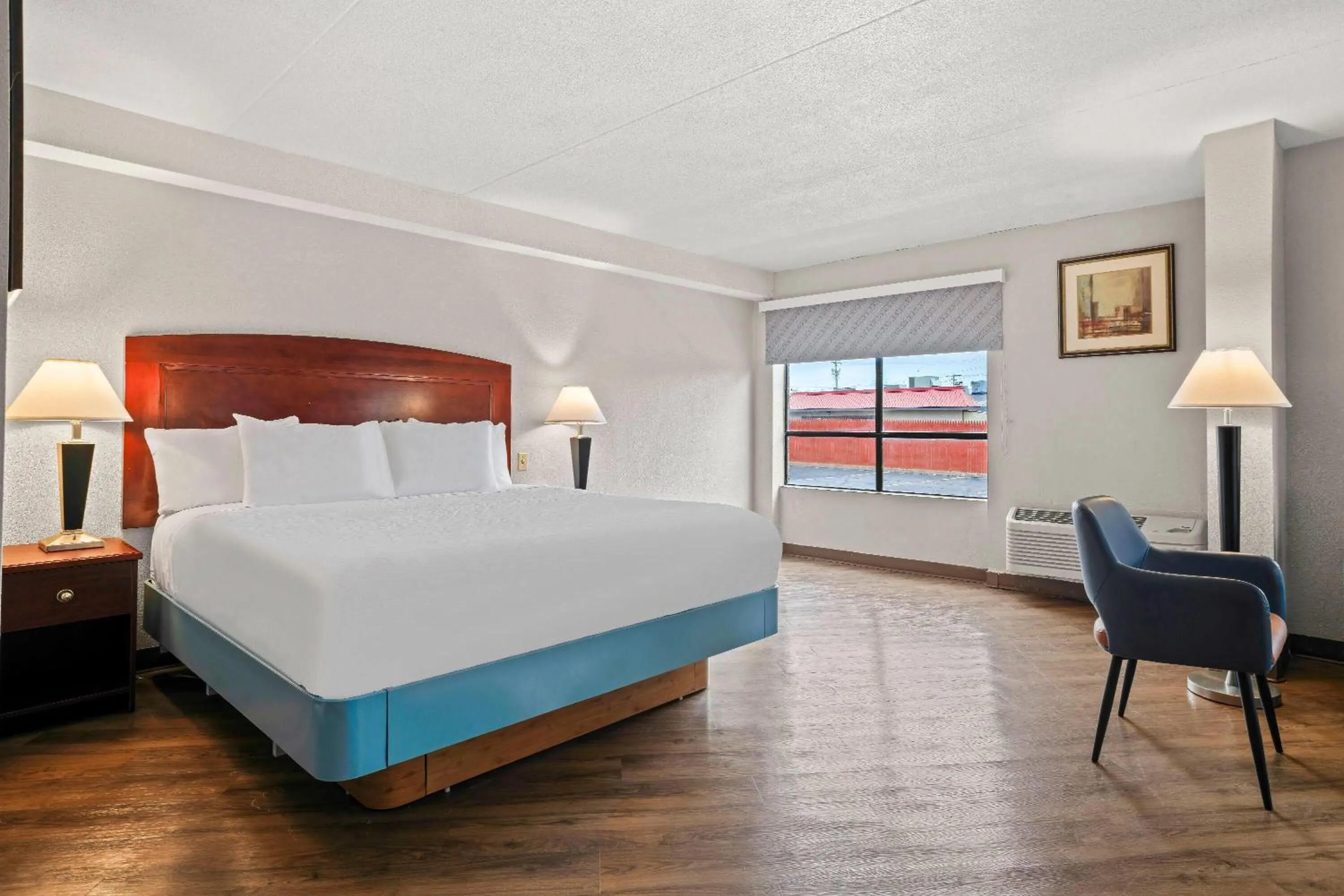 Photo of the whole room, Bed in Days Inn by Wyndham Utica