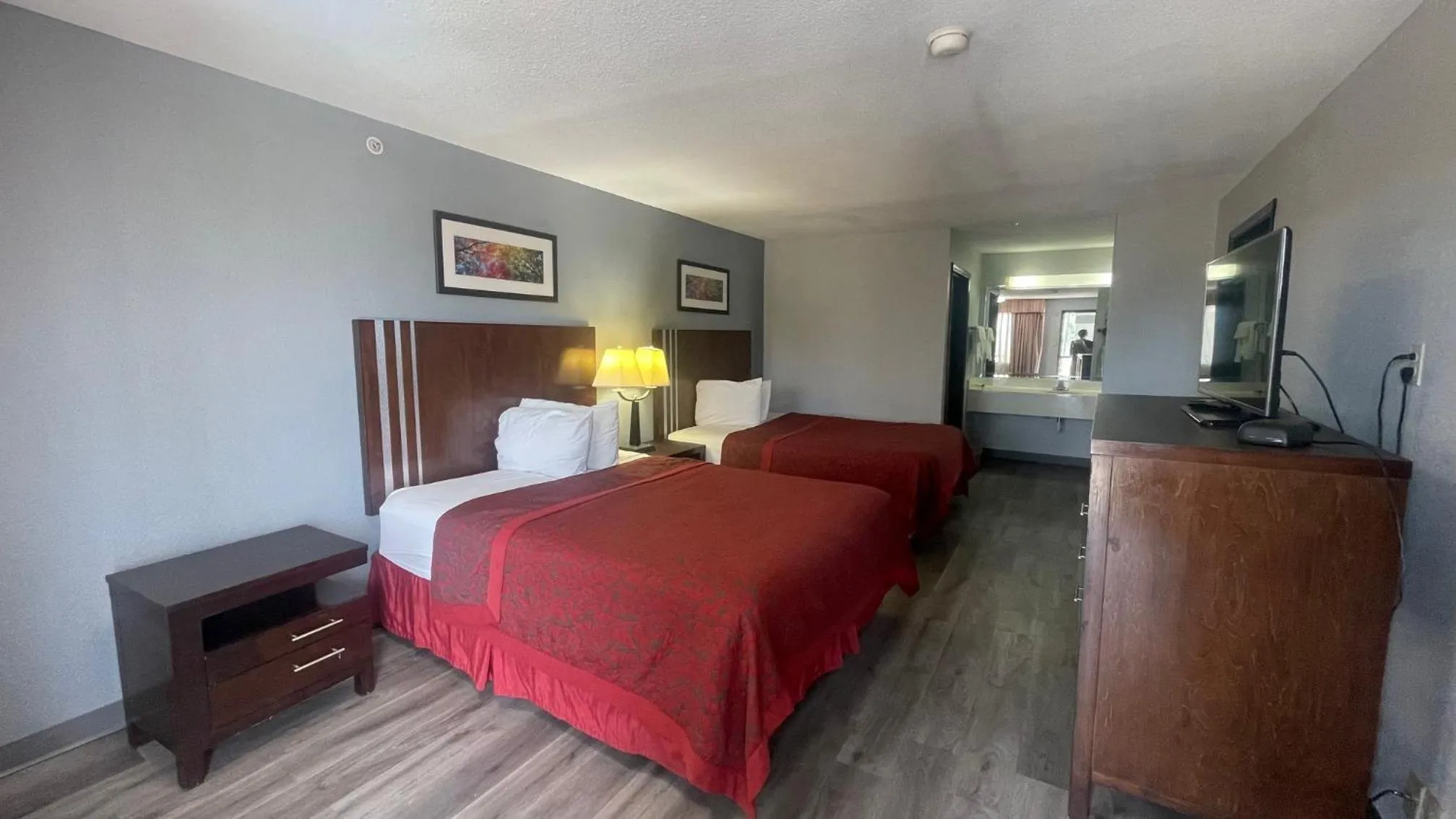 Bedroom, Bed in Days Inn & Suites by Wyndham Winnie