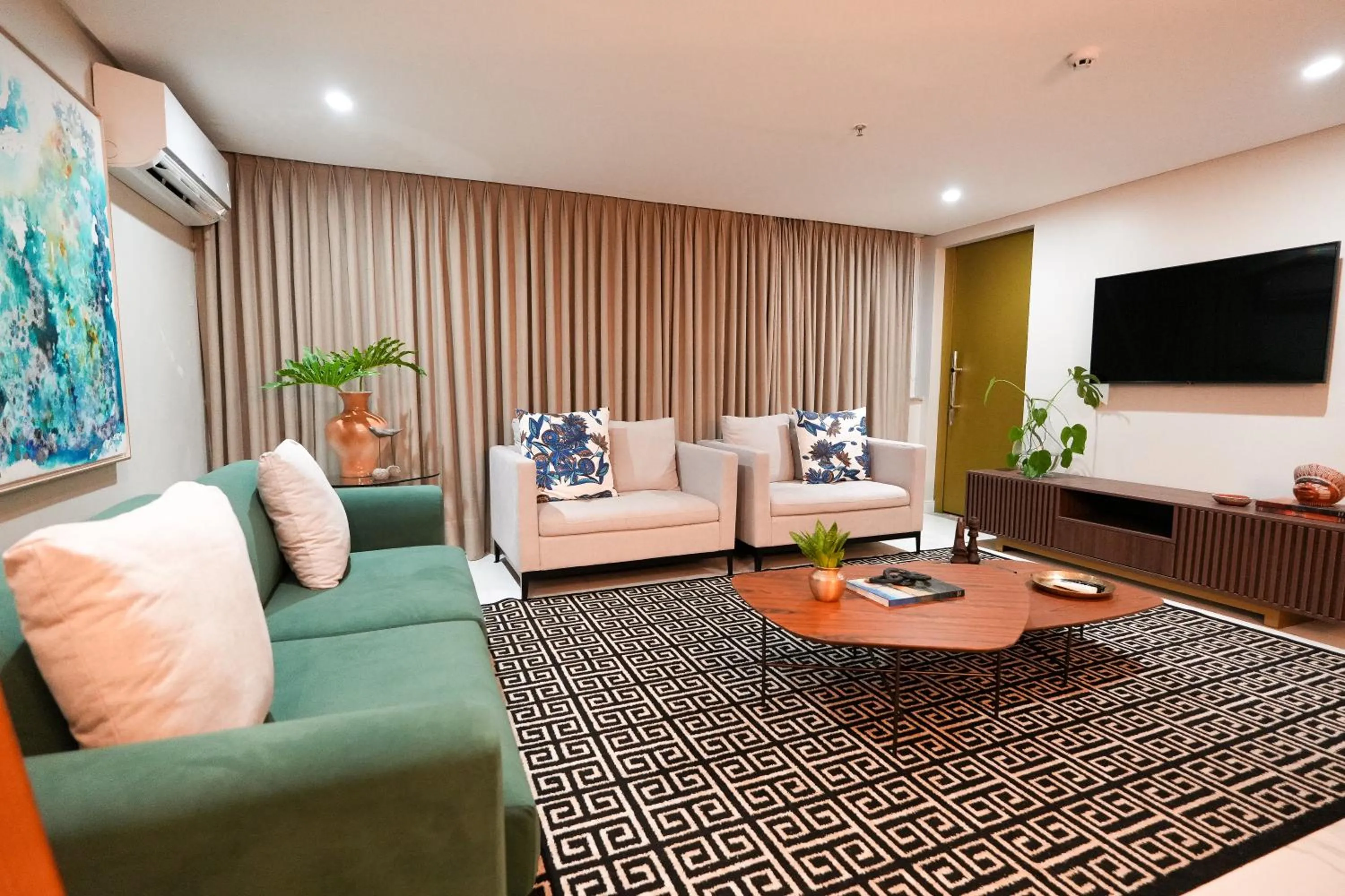 Communal lounge/ TV room in Grand Mercure Belem do Para
