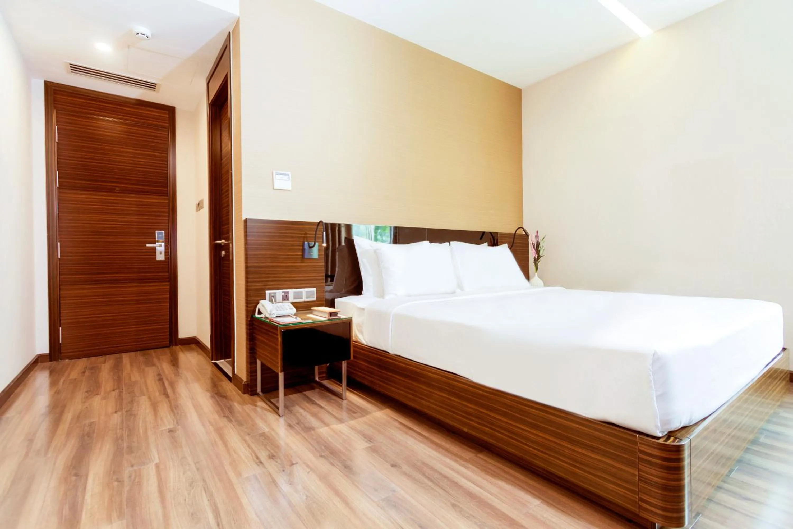 Bed in Queen Ann Hotel