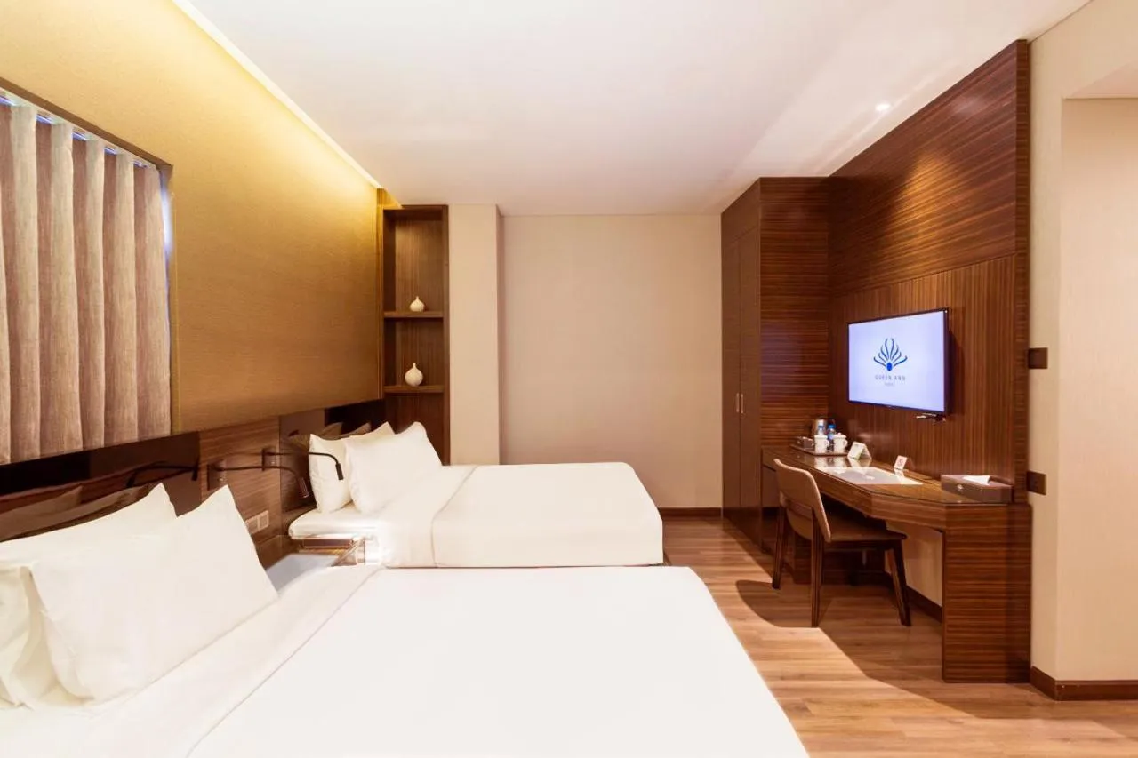 Bed in Queen Ann Hotel