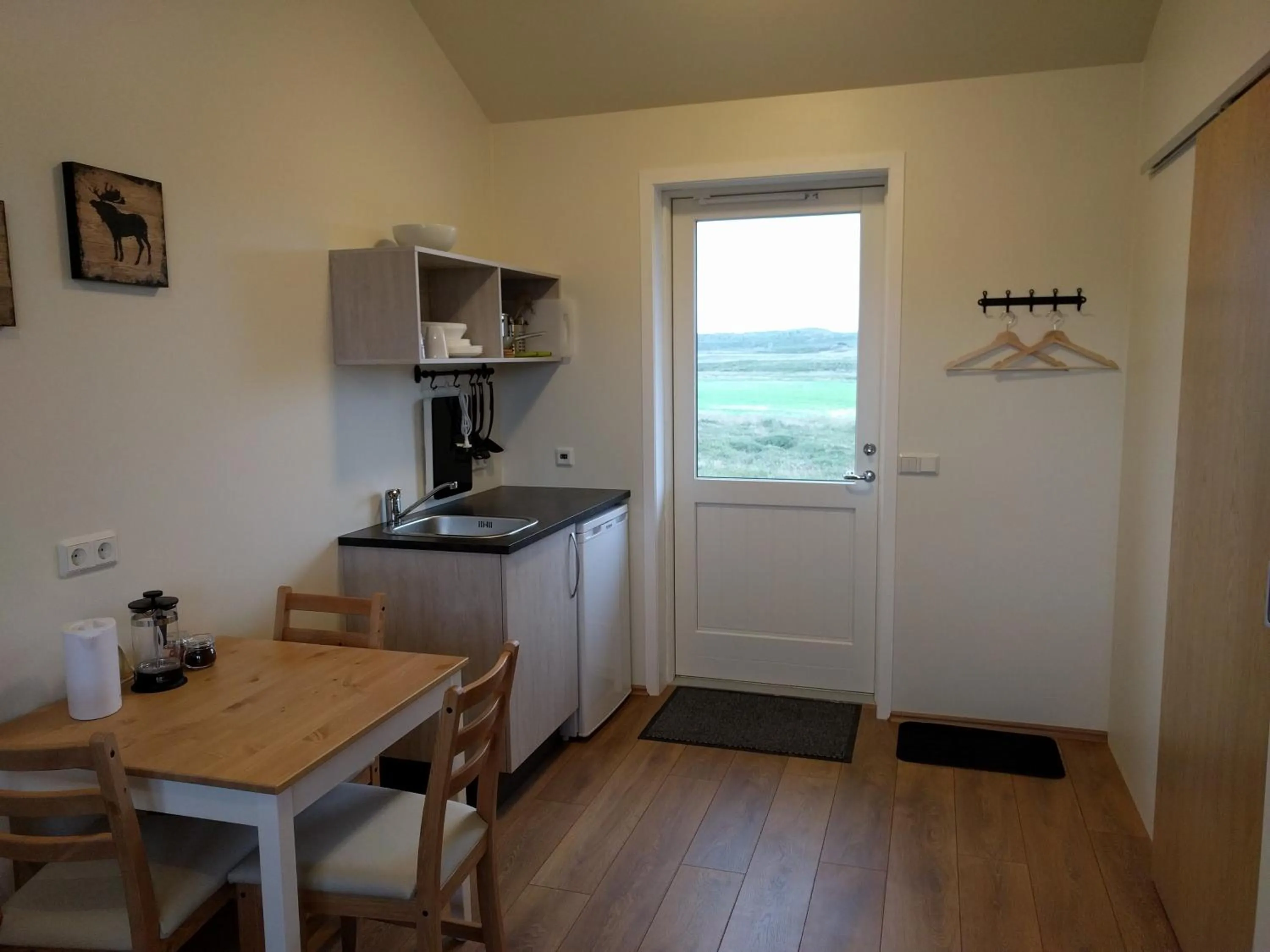 Kitchen or kitchenette in Hjartarstaðir Guesthouse