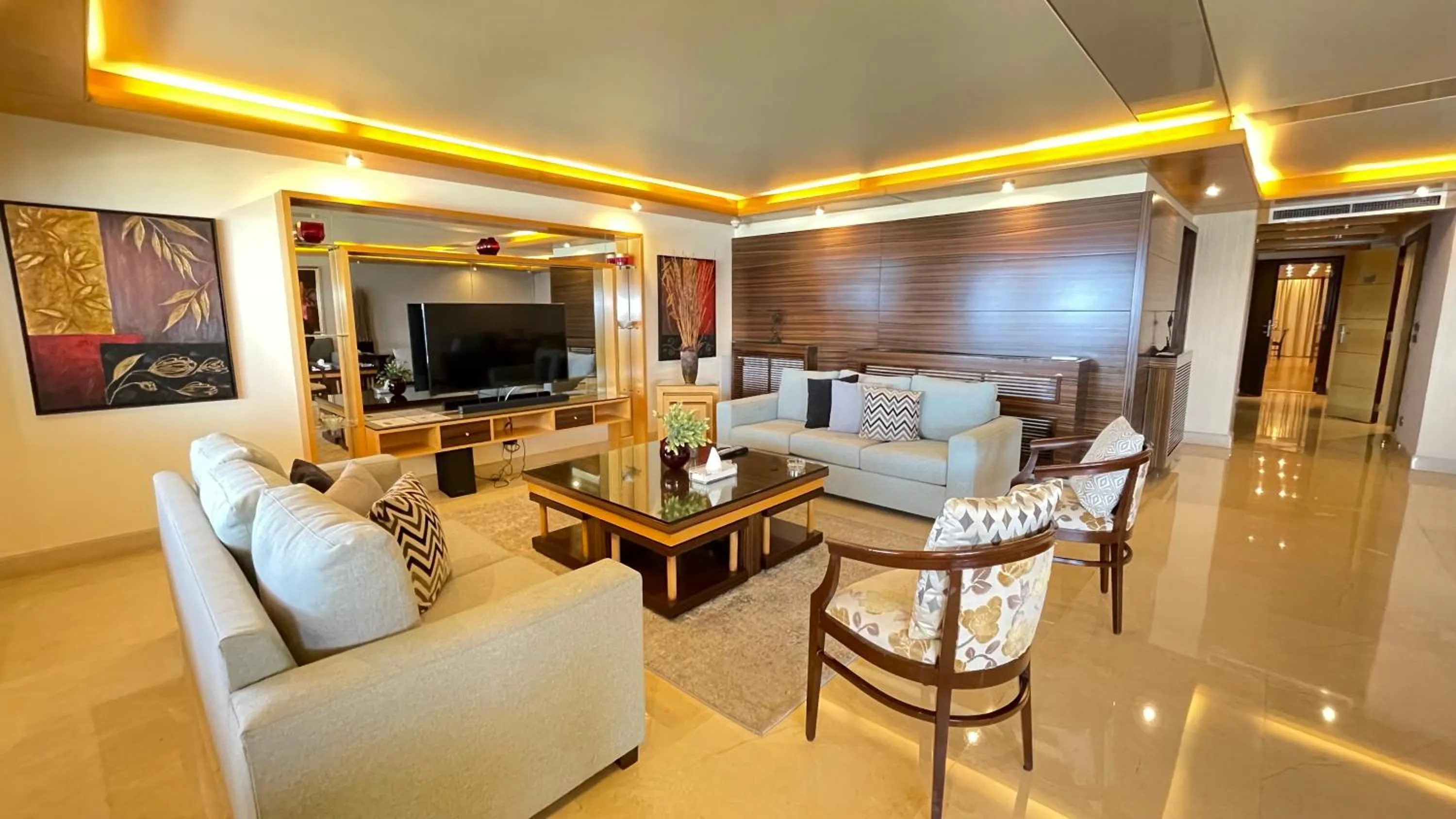 Communal lounge/ TV room in Lahoya Suites