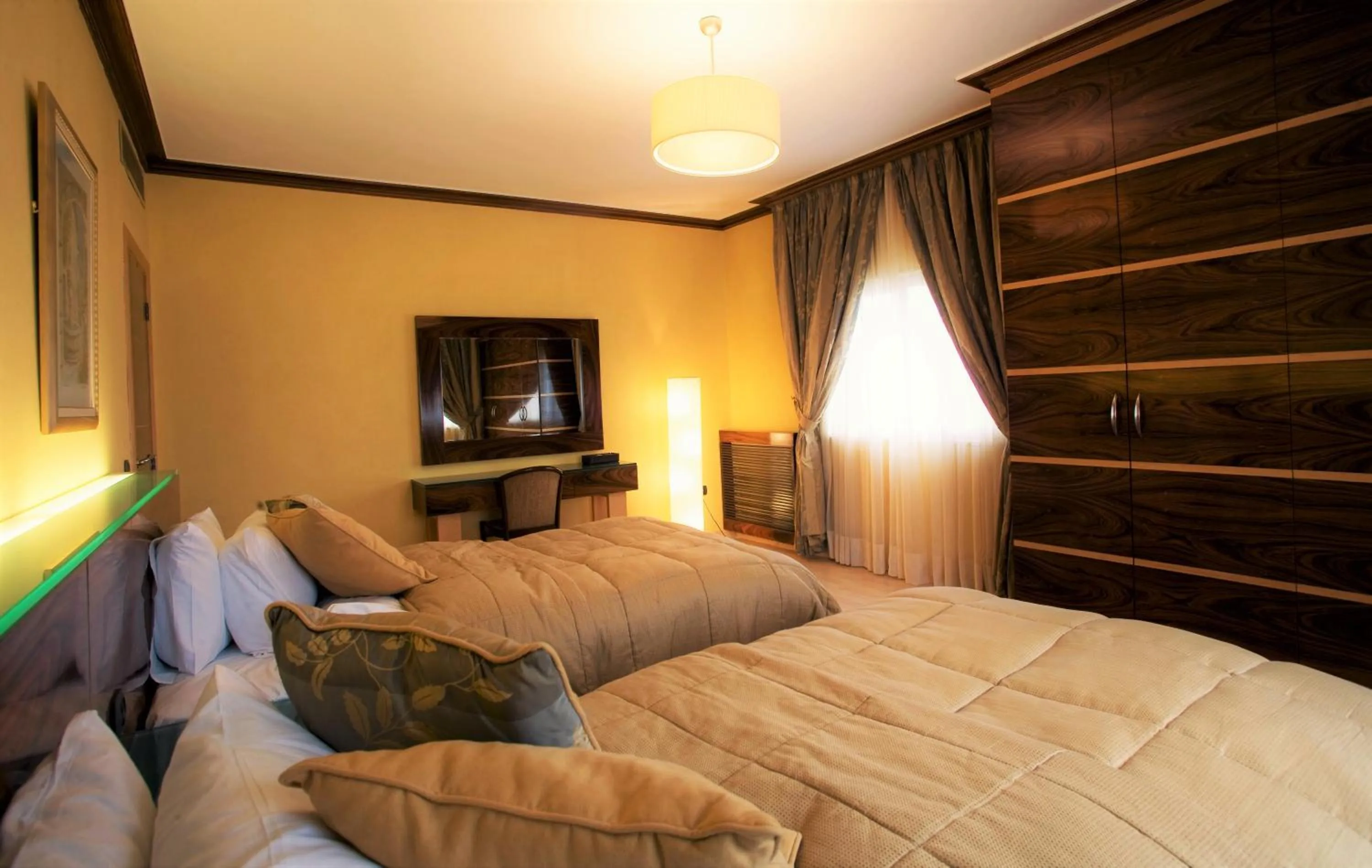 Bed in Lahoya Suites