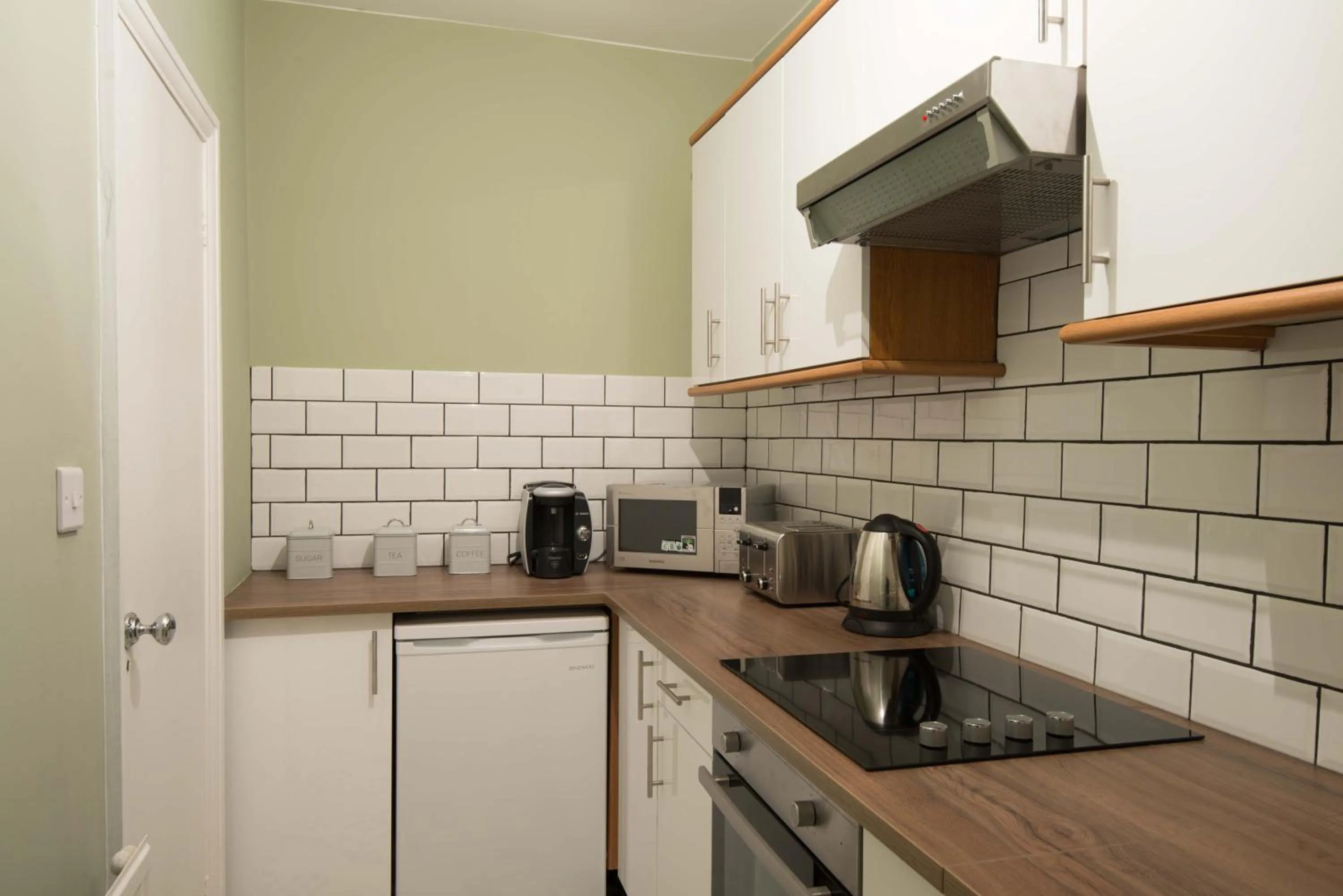 Kitchen or kitchenette in M-Hotels Studios & Apartments Free Parking