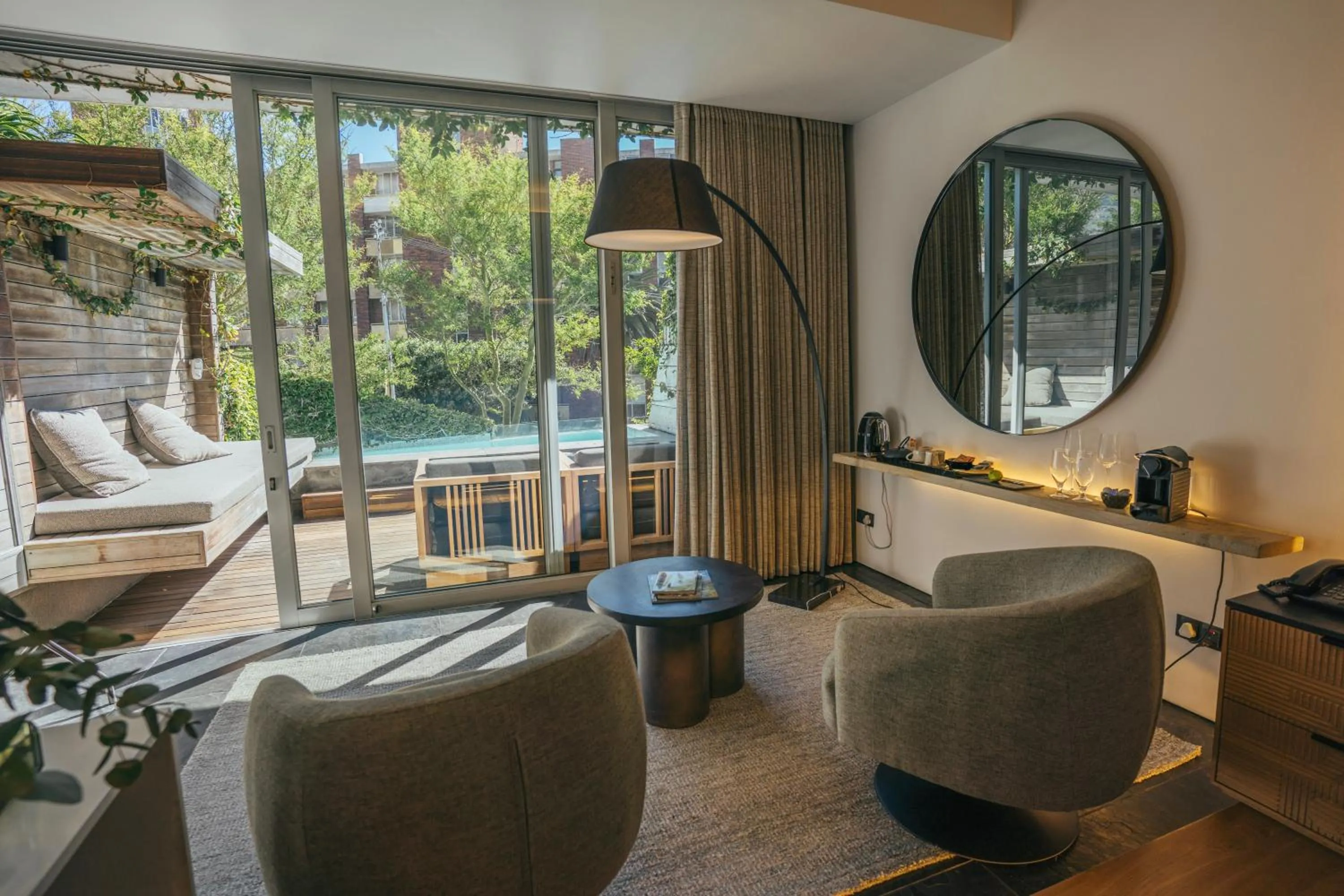 Seating area in POD Camps Bay by The Oyster Collection