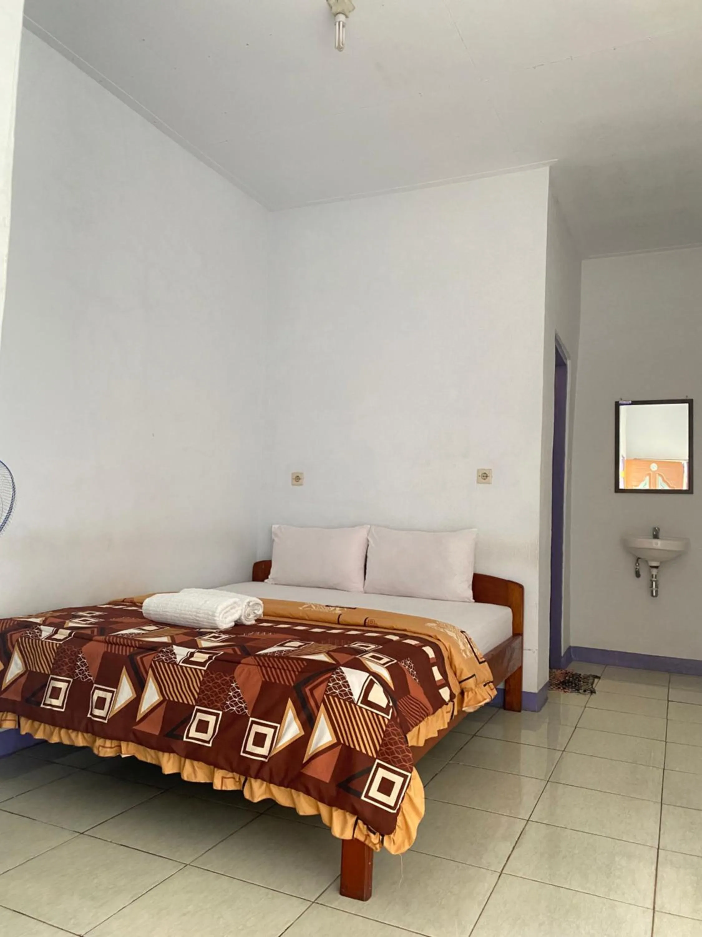 Bed in Mahoni Guest House