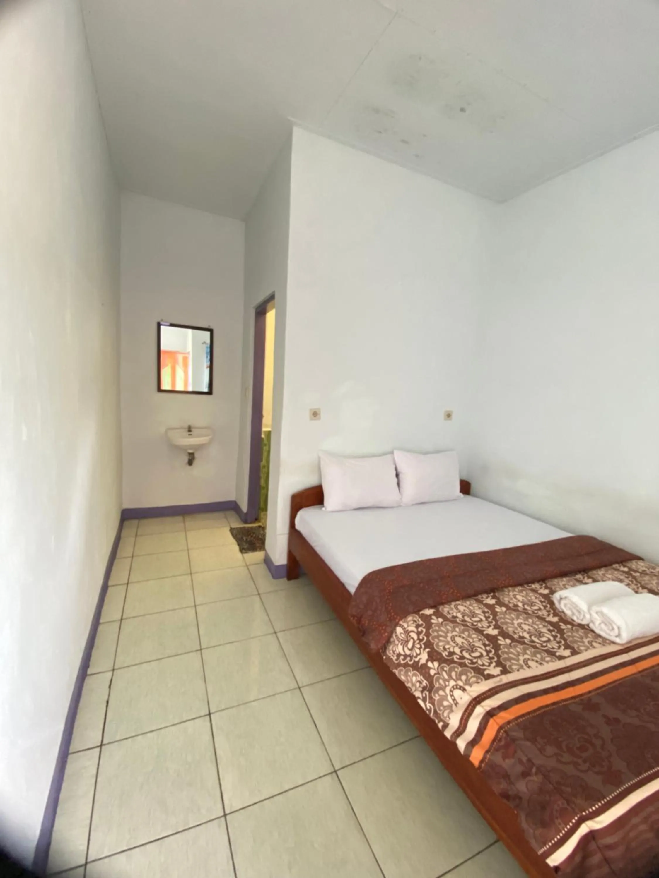 Bed in Mahoni Guest House