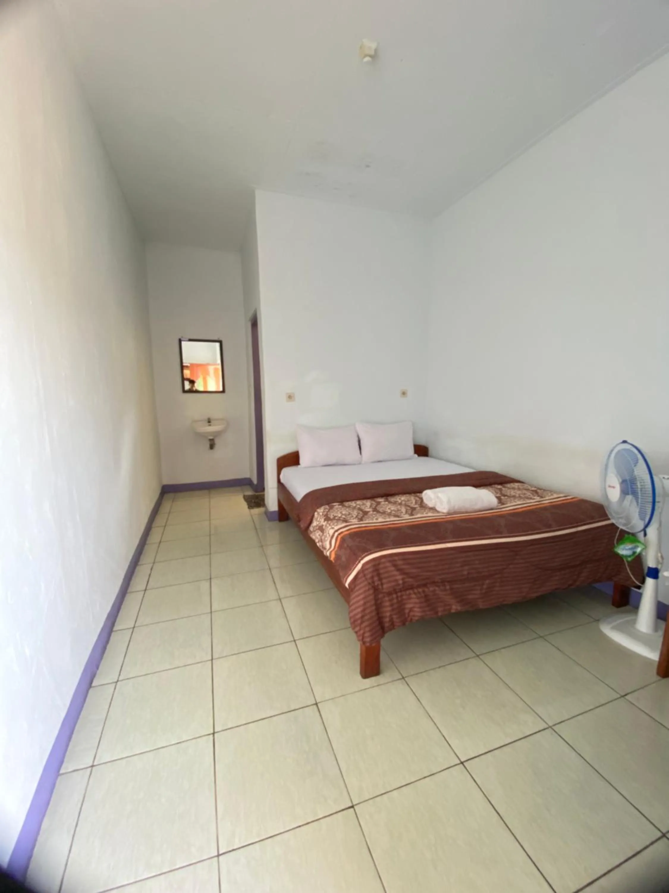 Bed in Mahoni Guest House